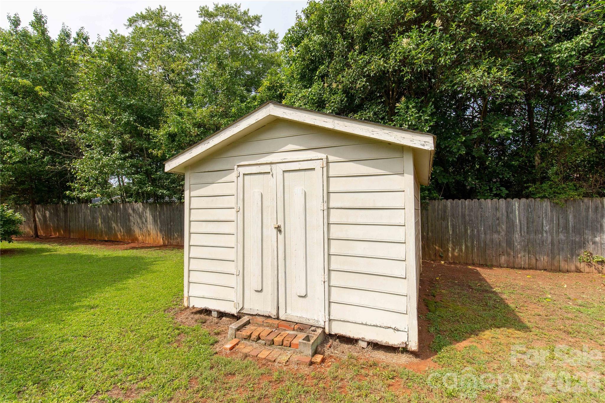 Storage shed for the lawn equipment - 755 Emorywood Lane, Rock Hill
