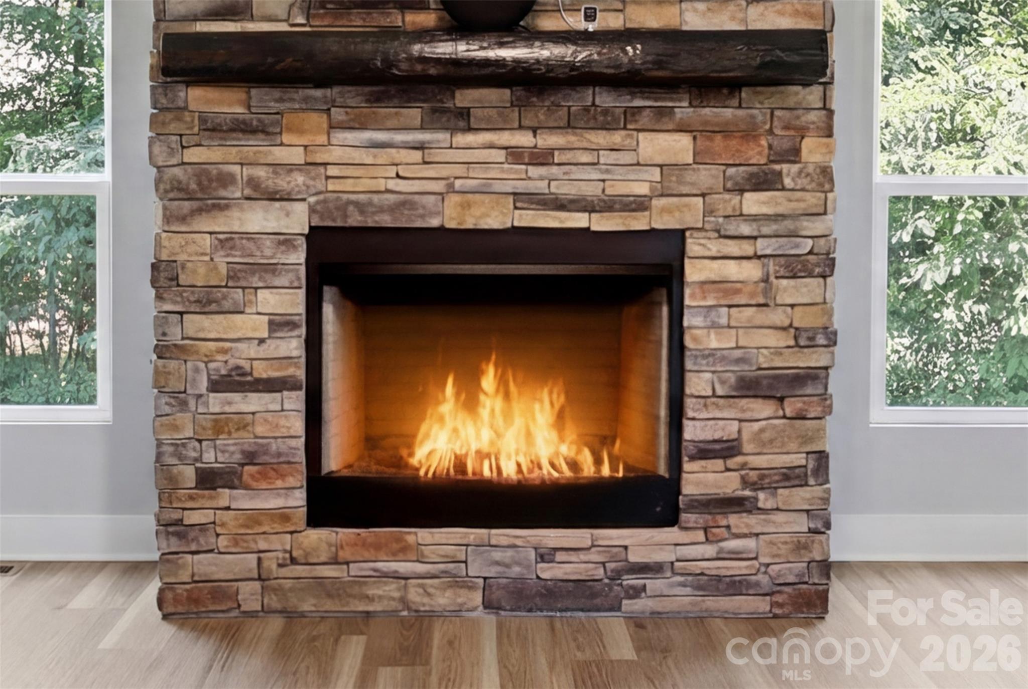 Stone veneer fireplace accents the great room as a centerpiece. - 1298 Cole Avenue, Rock Hill
