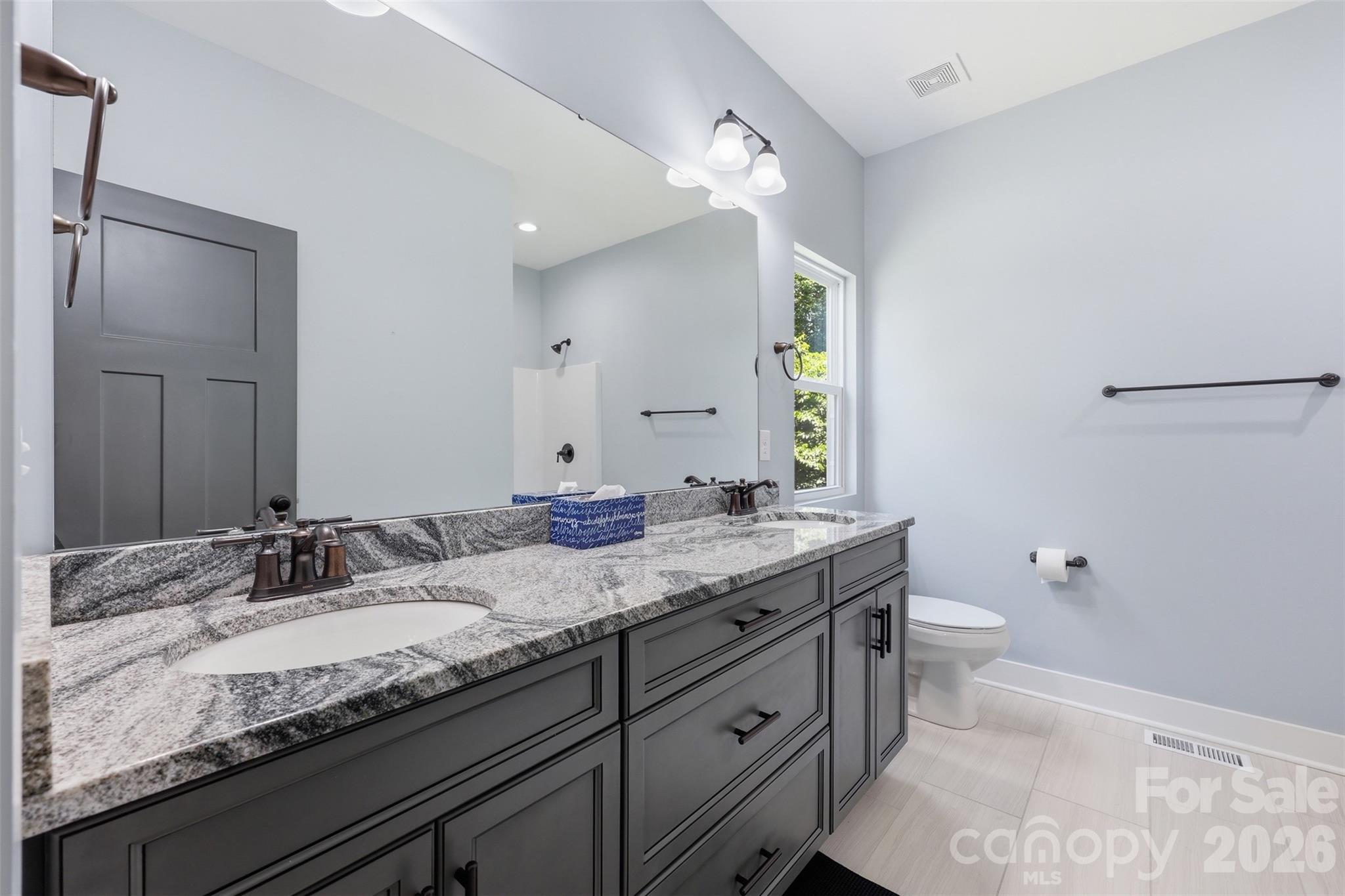 Spacious bathroom offers his and her sinks - 1298 Cole Avenue, Rock Hill