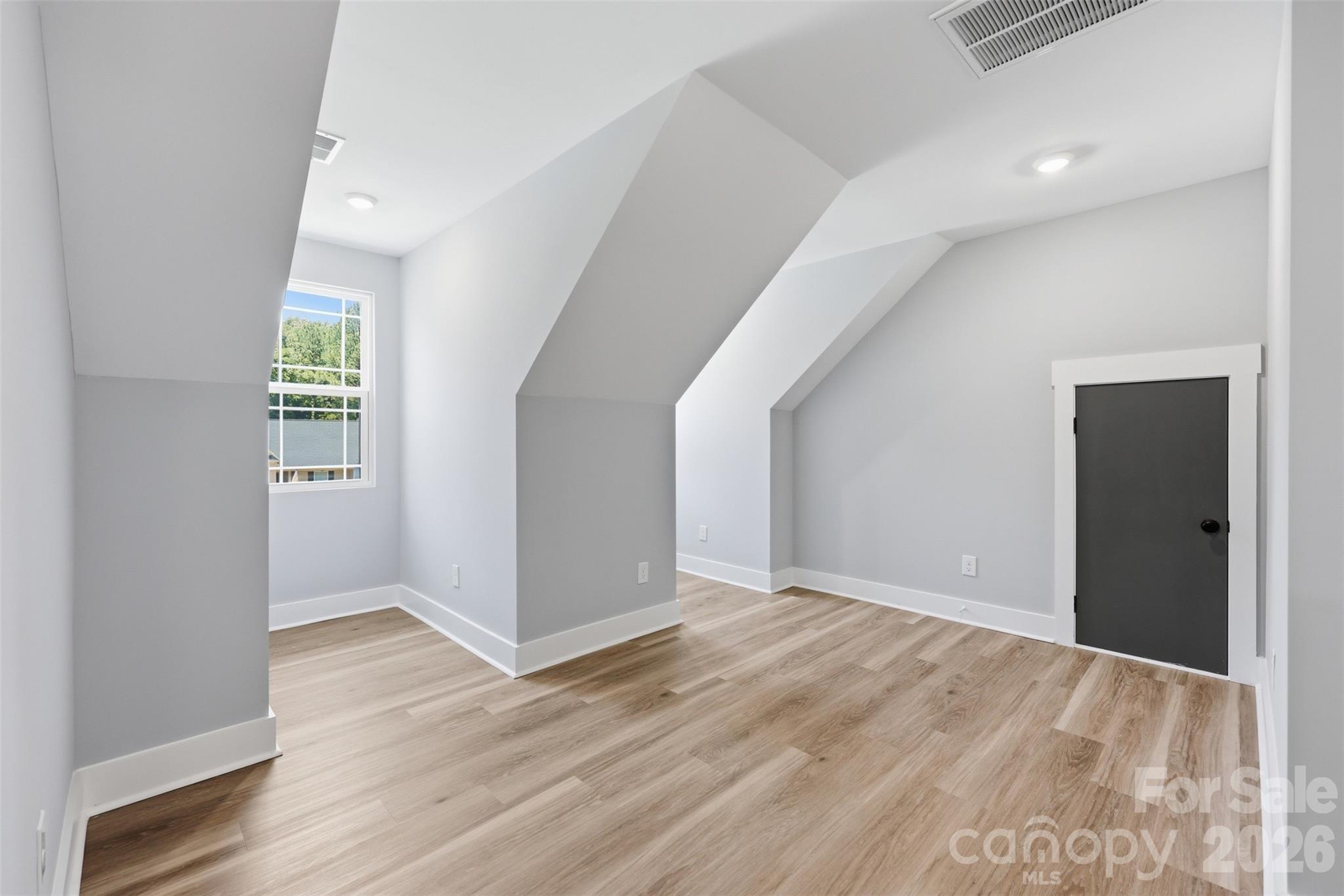 Loft with dormer windows offer great additional space for desks, media, or watching the stars with your telescope - 1298 Cole Avenue, Rock Hill
