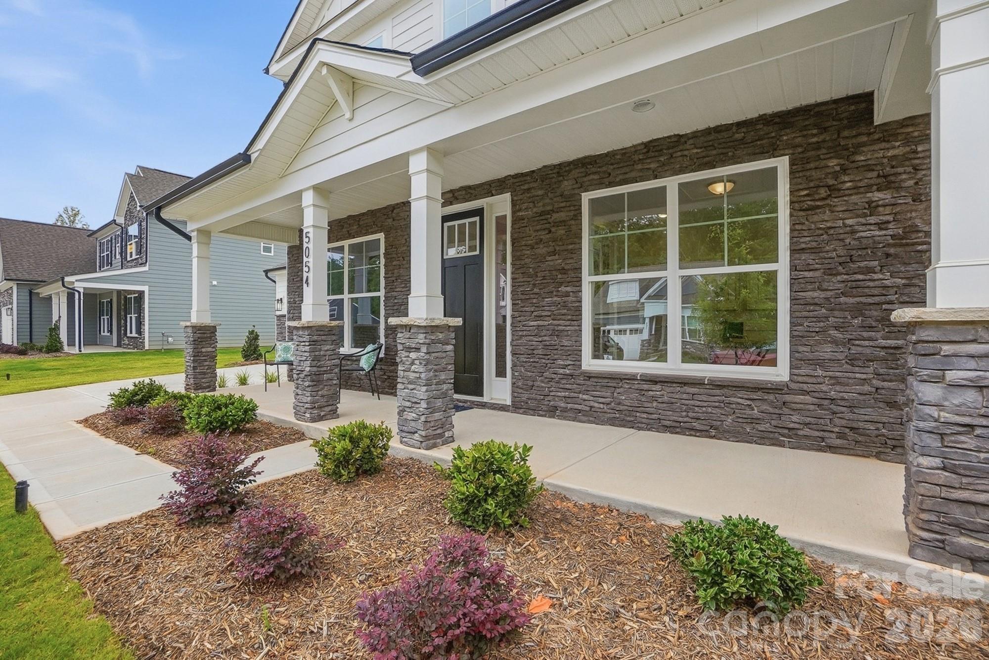 Homesite 96 features a Colfax L floorplan - 5054 McLaughlin Loop, Waxhaw