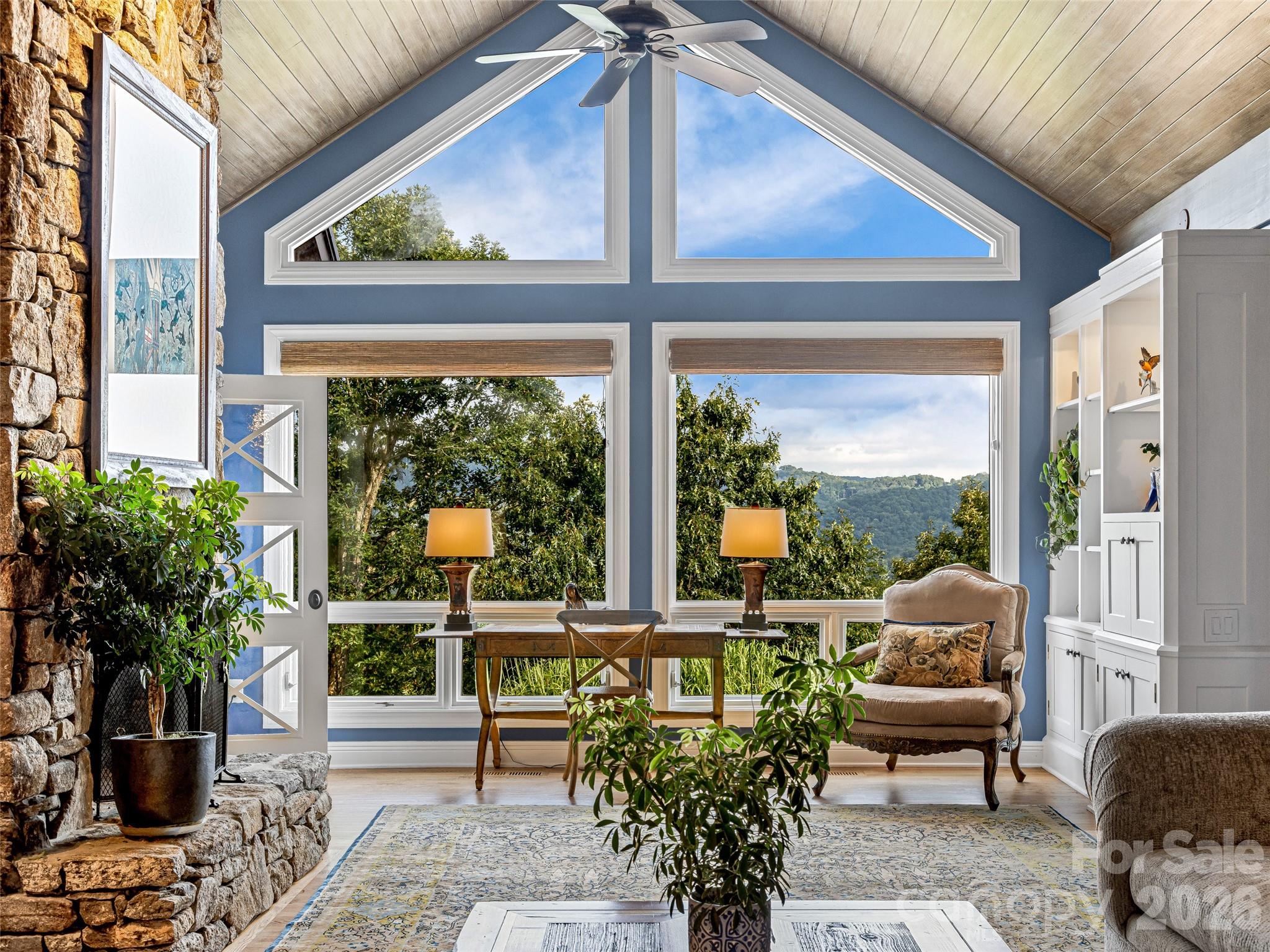 Primary Suite sitting room with gas fireplace and beautiful veiws. - 10 Beaverbrook Court, Asheville