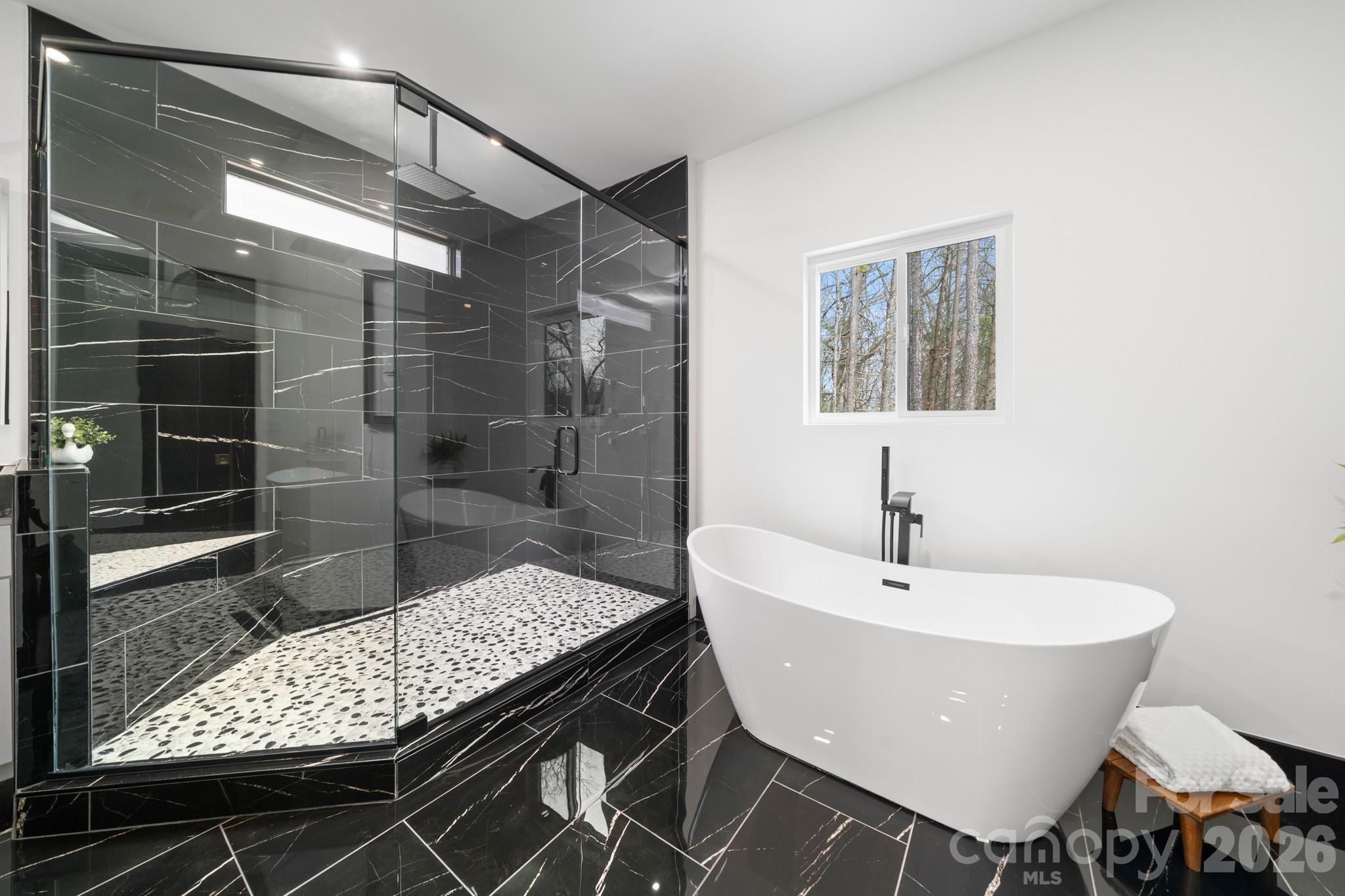 Primary bathroom, soaker tub and walk in shower and rainfall showerhead - 74 Jeranna Road, Mills River