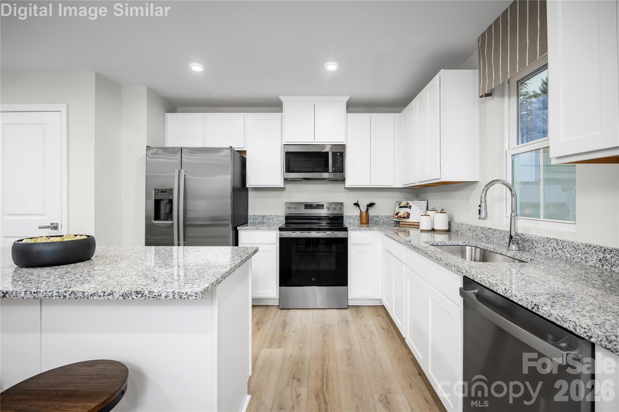 The Heart of the Home! This kitchen shines with space, style, and functionality—where meals, memories, and moments come together! - 3906-2 15TH Street Drive NE, Hickory