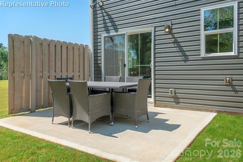 Fire up the grill! Enjoy BBQs, morning coffee, or evening chats on your spacious 10x12 back patio—your private outdoor escape! - 3906-2 15TH Street Drive NE, Hickory