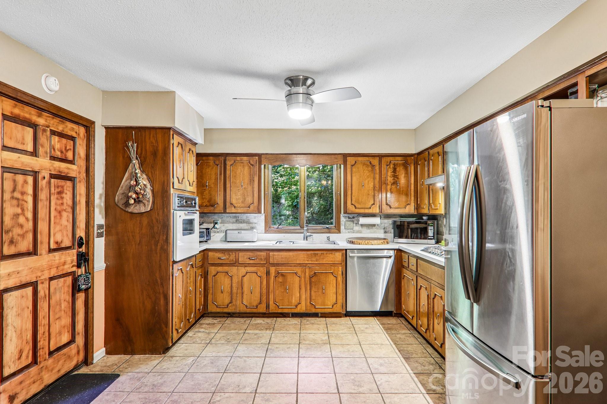 Side Entrance from the kitchen to backyard - 2291 Little River Road, Hendersonville