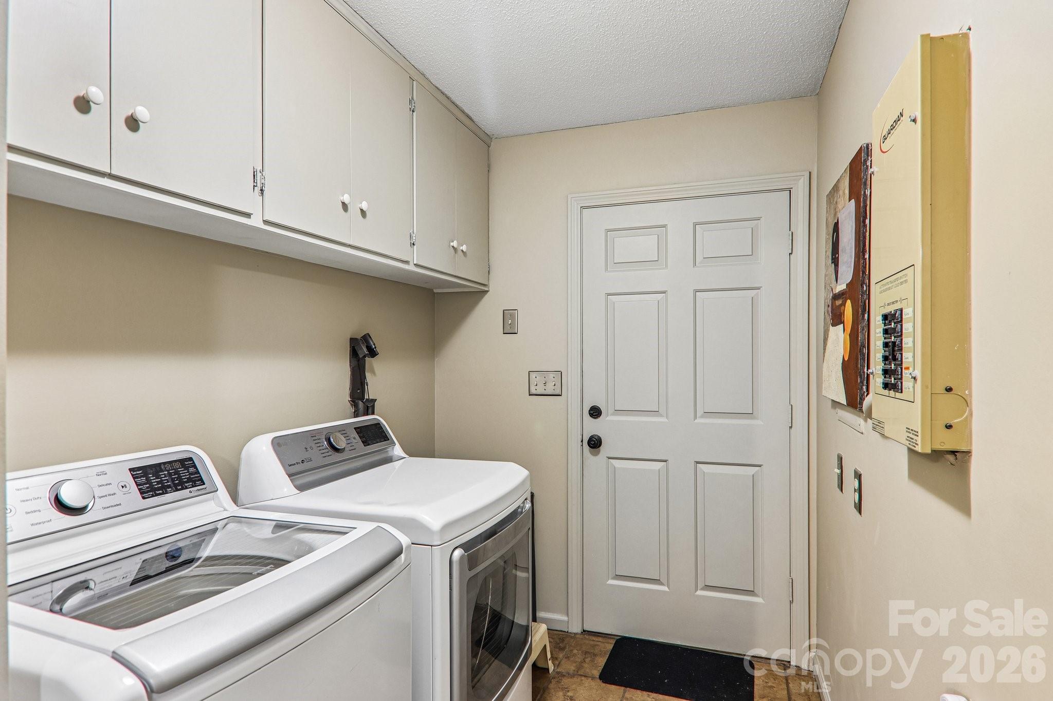 Laundry room, door leading to garage - 2291 Little River Road, Hendersonville