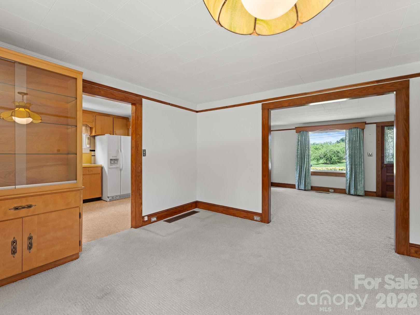 Dining area with custom build in - 1230 Dana Road, Hendersonville