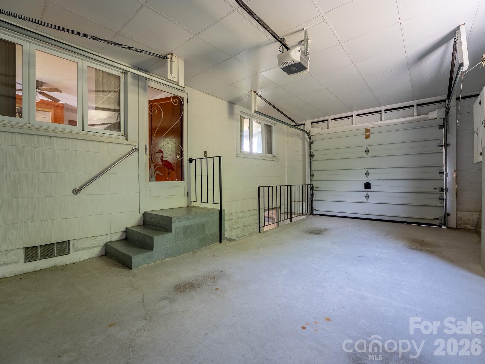 Attached one car garage interior - 1230 Dana Road, Hendersonville