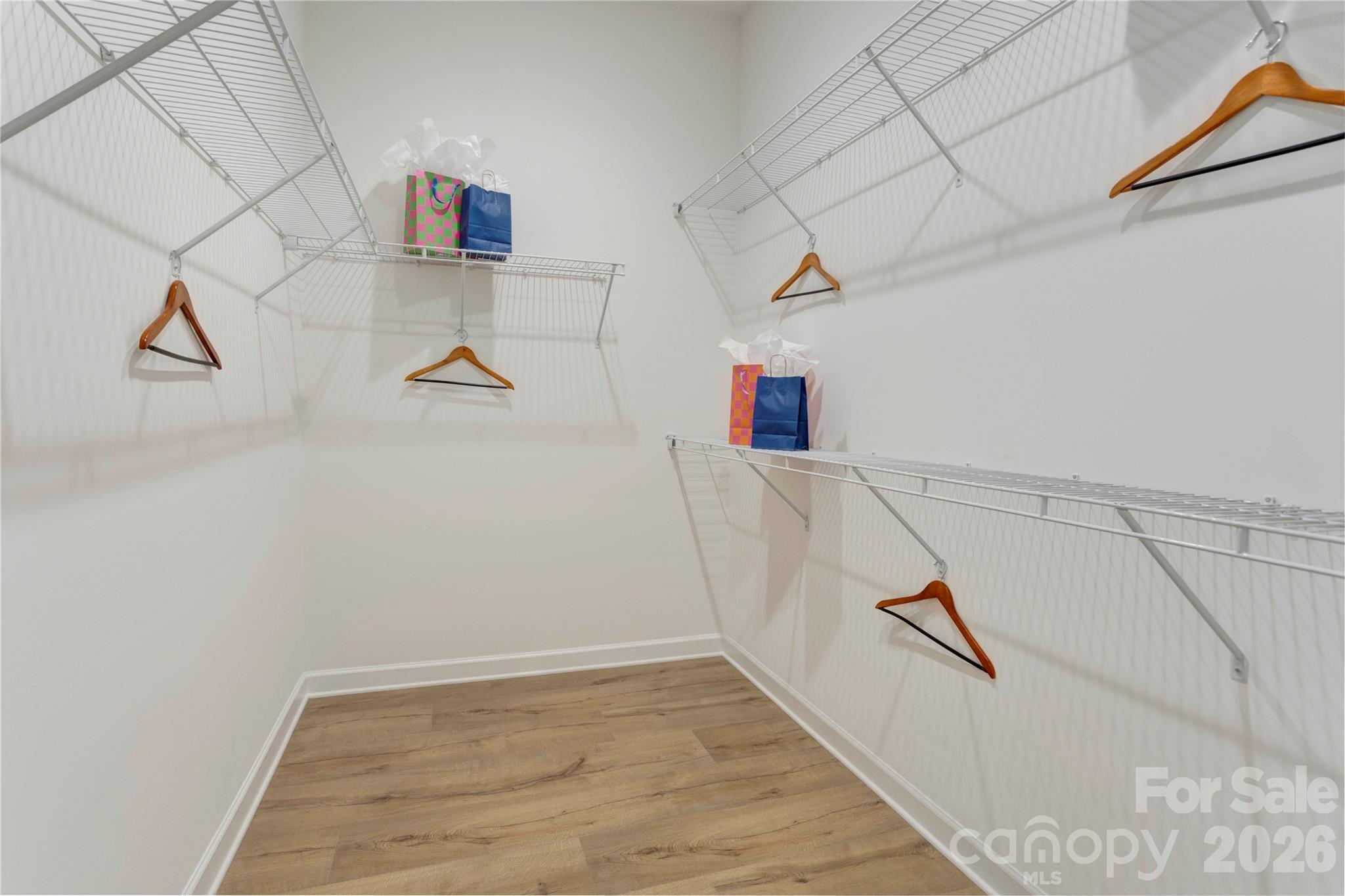 Primary closet connects to laundry room - 471 Lucky Drive NW, Concord