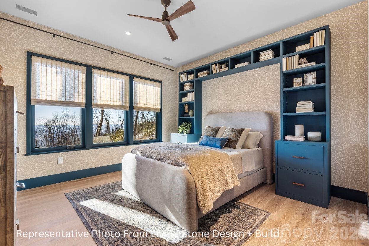 Bedroom. Representative photo from Living Stone Design + Build showing the craftsmanship, quality of construction and finish level. Final design, finishes, and details may vary. - 488 Warbler Lane, Black Mountain
