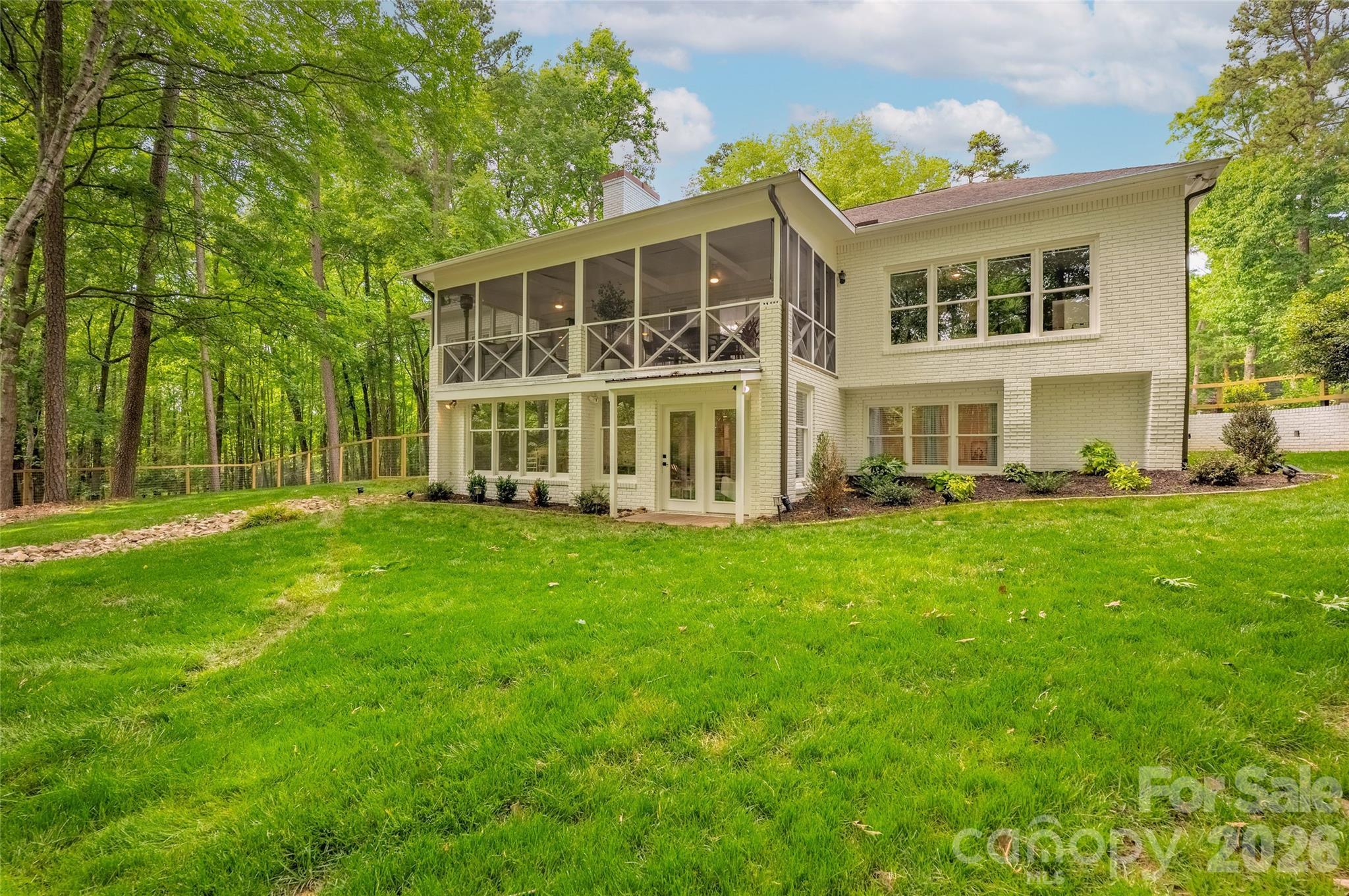 Back of home with walk out lower level - 1800 Chestnut Lane, Matthews