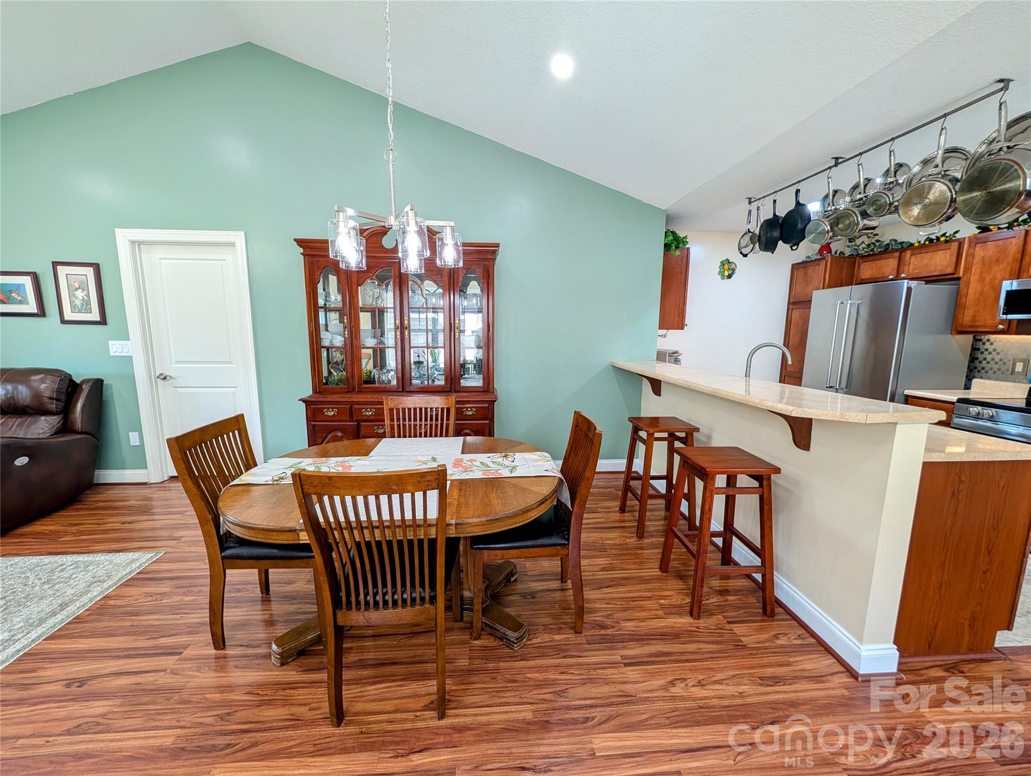 Large dining area with new chandelier - 65 Foxden Drive, Fletcher