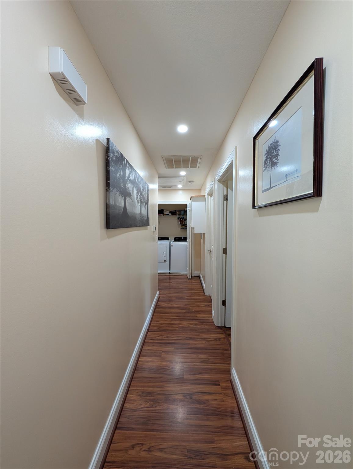 Front hallway with laundry closet - 65 Foxden Drive, Fletcher