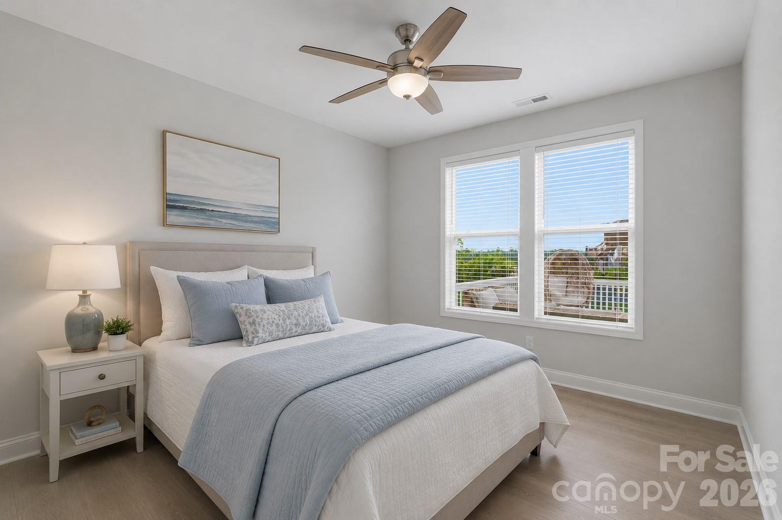 Bedroom on main level virtually staged. - 2107 Masons Bend Drive, Fort Mill