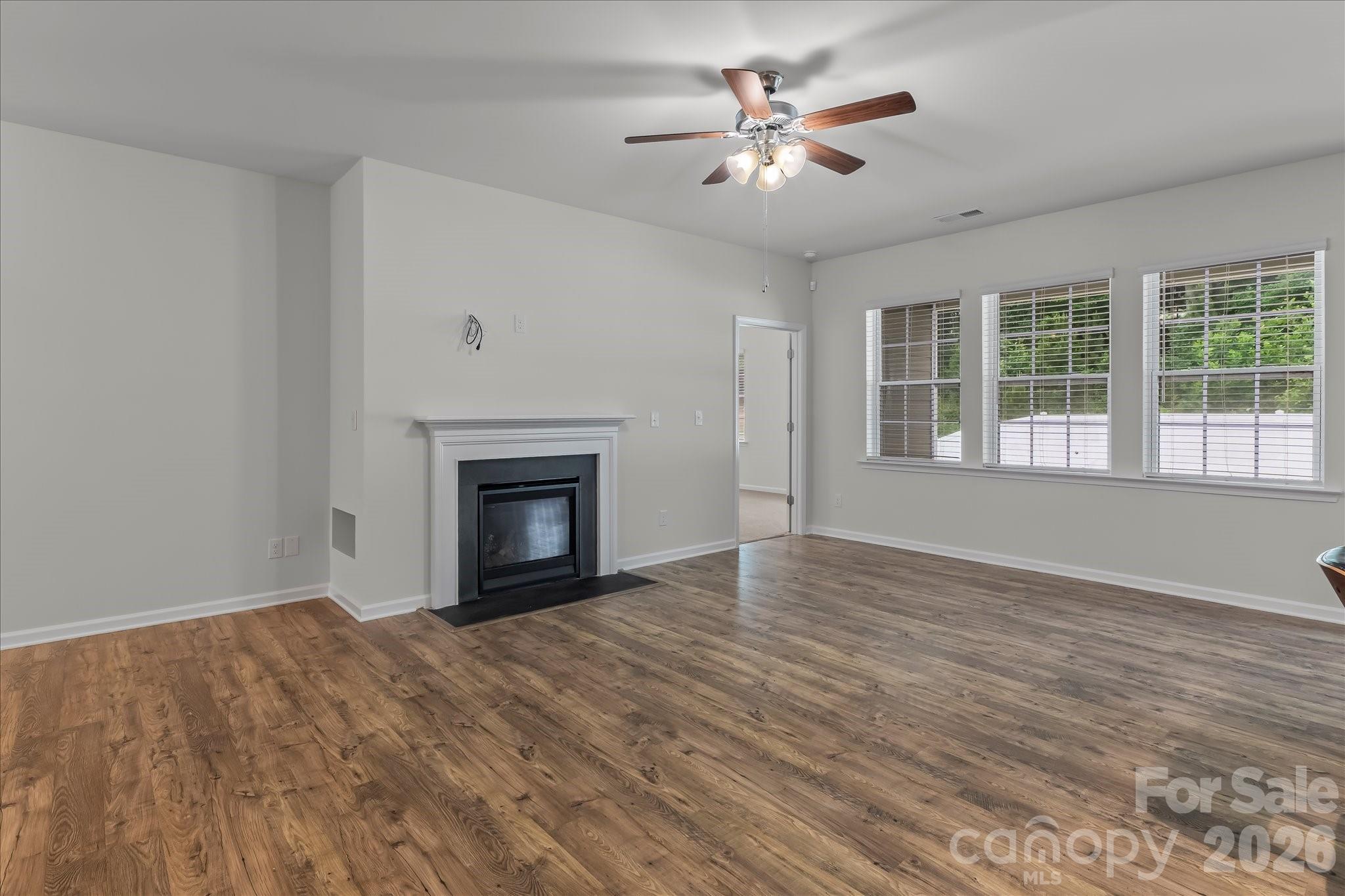 Family room with views of the private back yard - 188 Cherry Birch Street, Mooresville