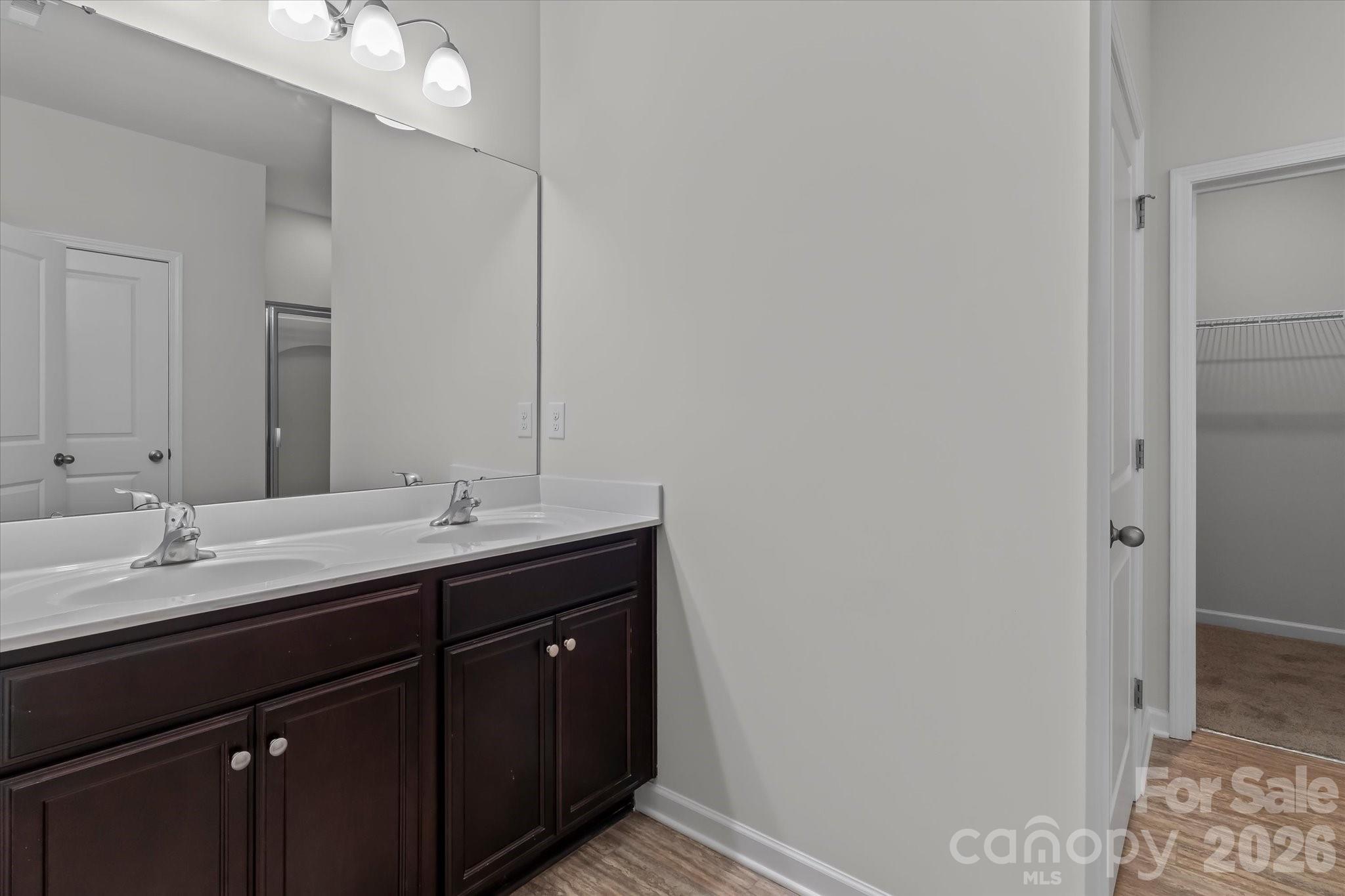Primary bathroom with dual vanities - 188 Cherry Birch Street, Mooresville
