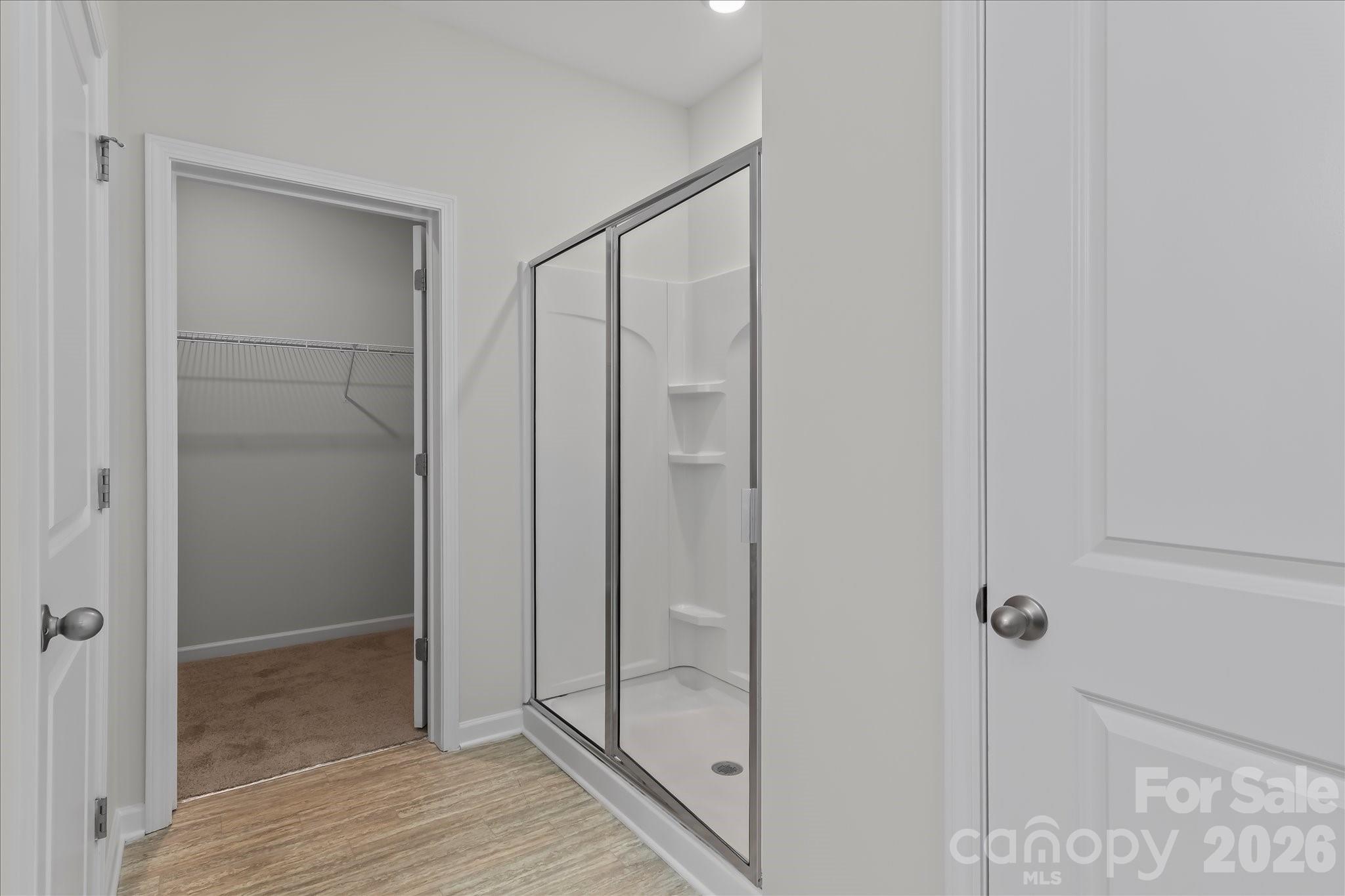Primary bathroom with oversized shower & walk-in closet - 188 Cherry Birch Street, Mooresville