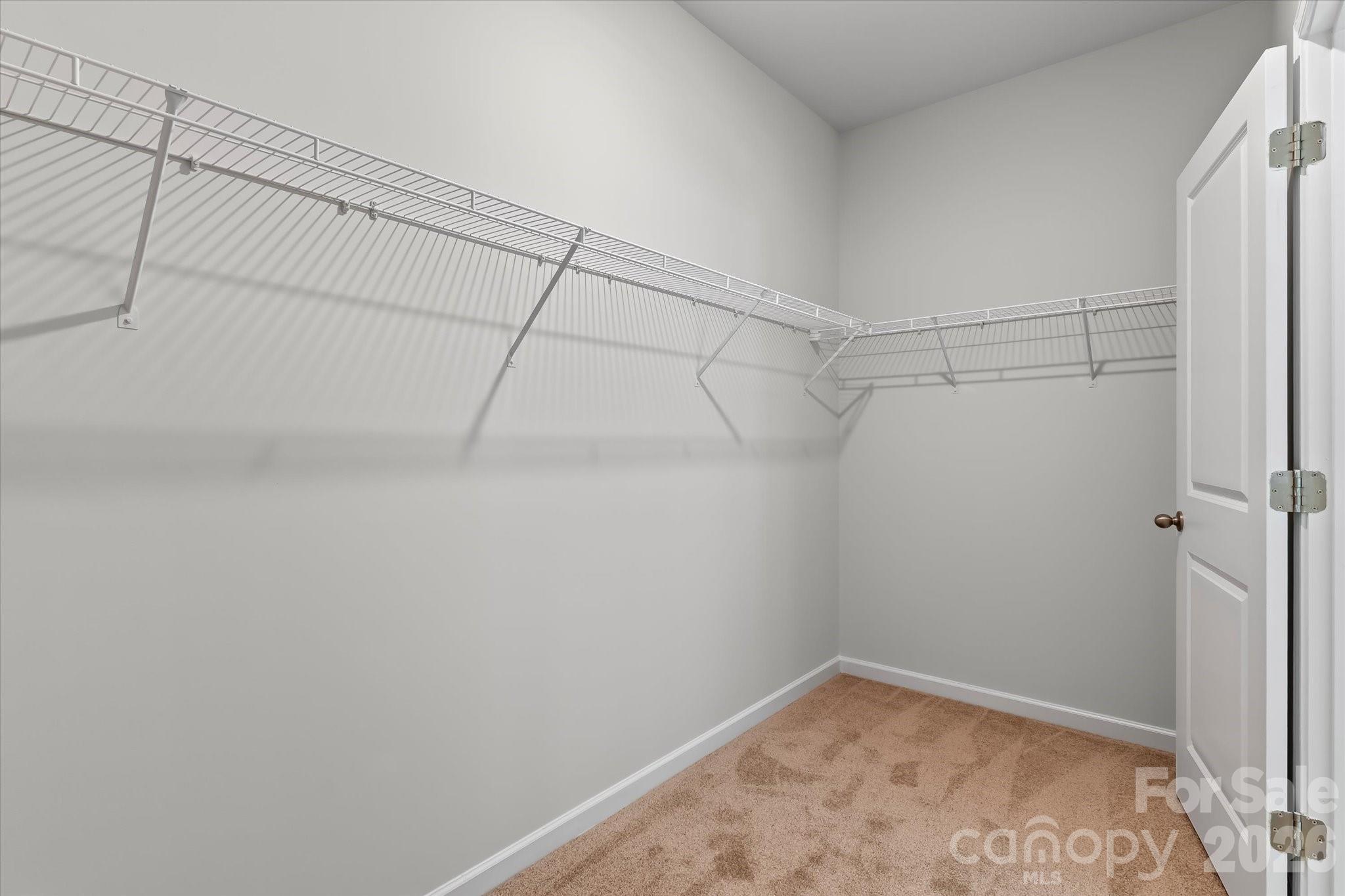 Primary bedroom walk-in closet - 188 Cherry Birch Street, Mooresville