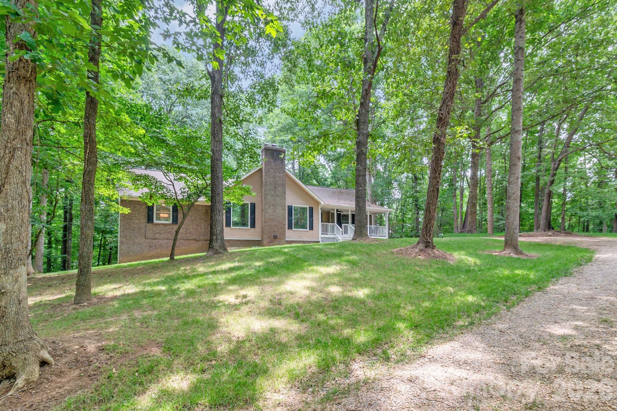 Private gravel driveway entry to left off Richardson King Road - 9205 Richardson King Road, Waxhaw