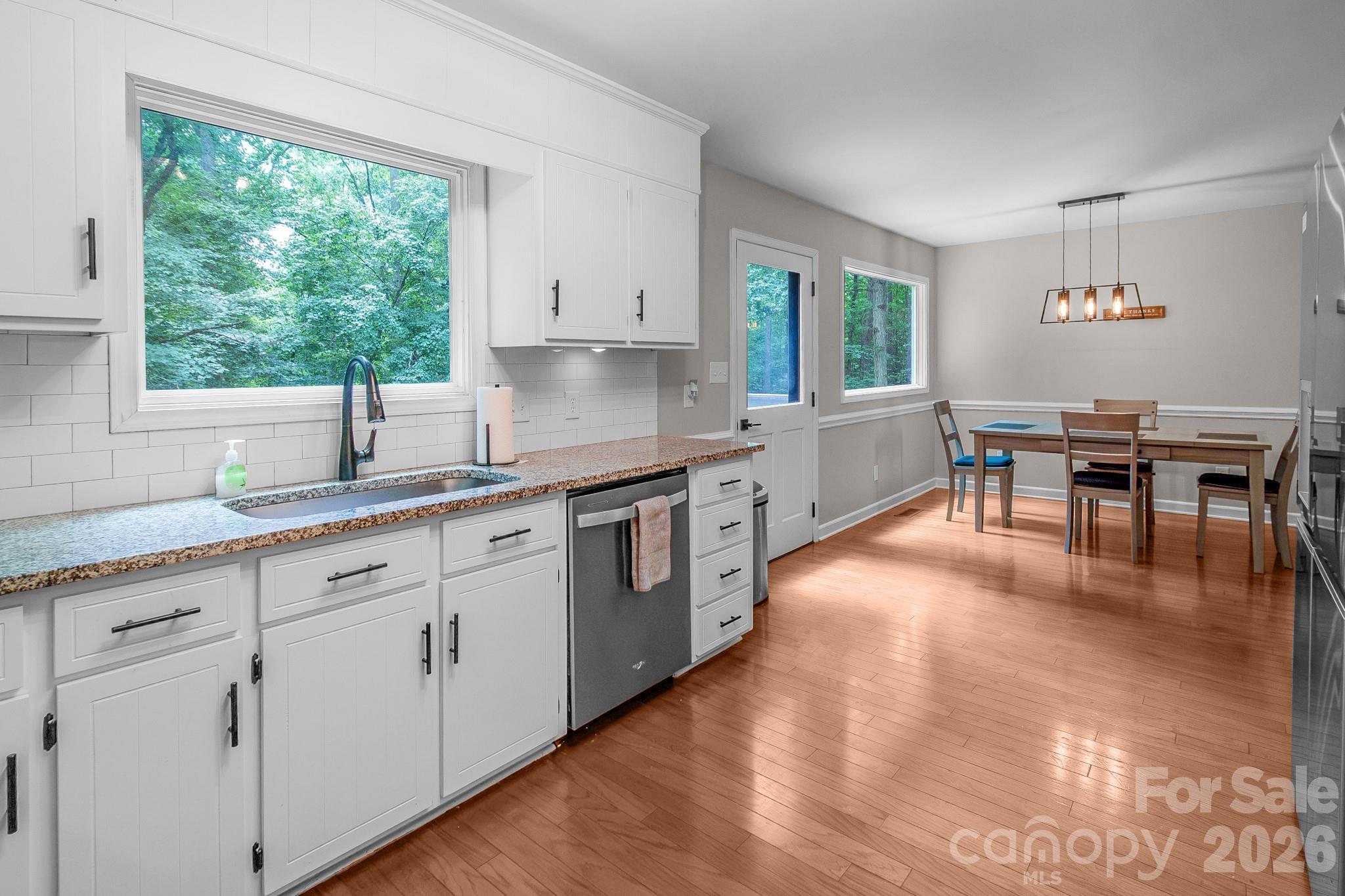 Modern kitchen updates with new windows and back door in 2022 - 9205 Richardson King Road, Waxhaw
