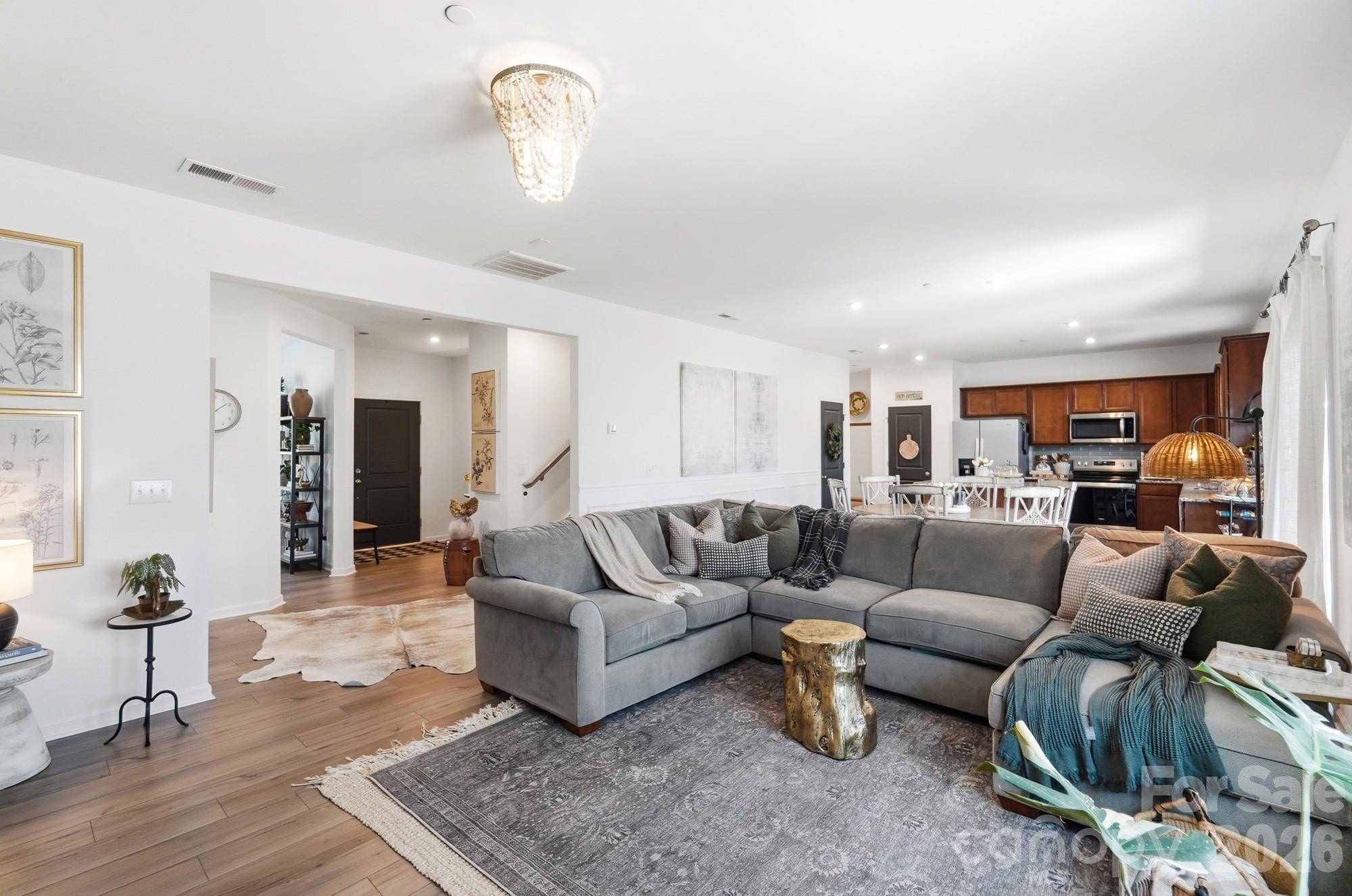 This open concept large living space is giving all the feels! - 1246 Nesters Store Place SW, Concord