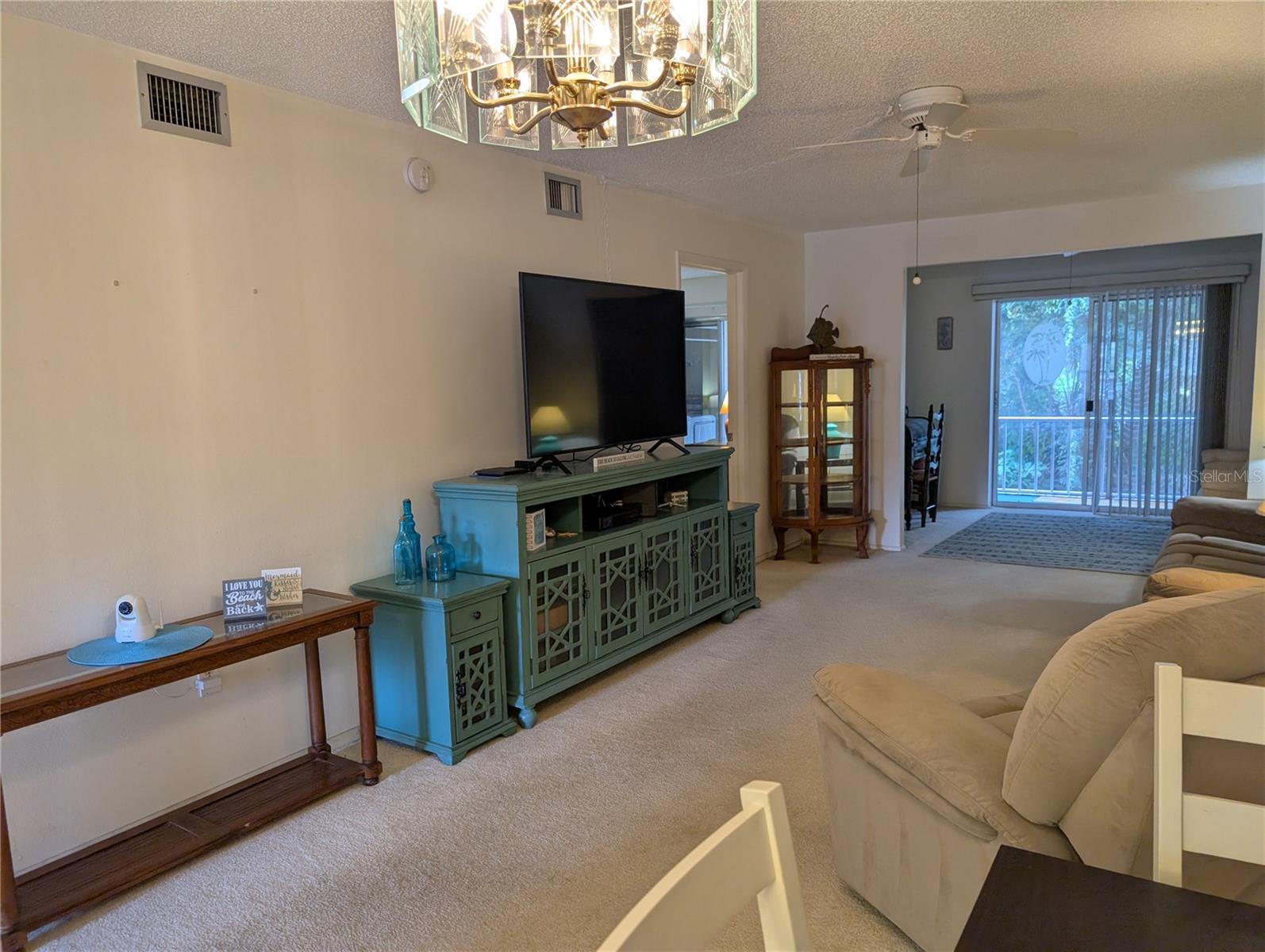 Living room with quiet, relaxing sofa & work area beyond. - 3564 LAKE BAYSHORE DR #K-203, BRADENTON