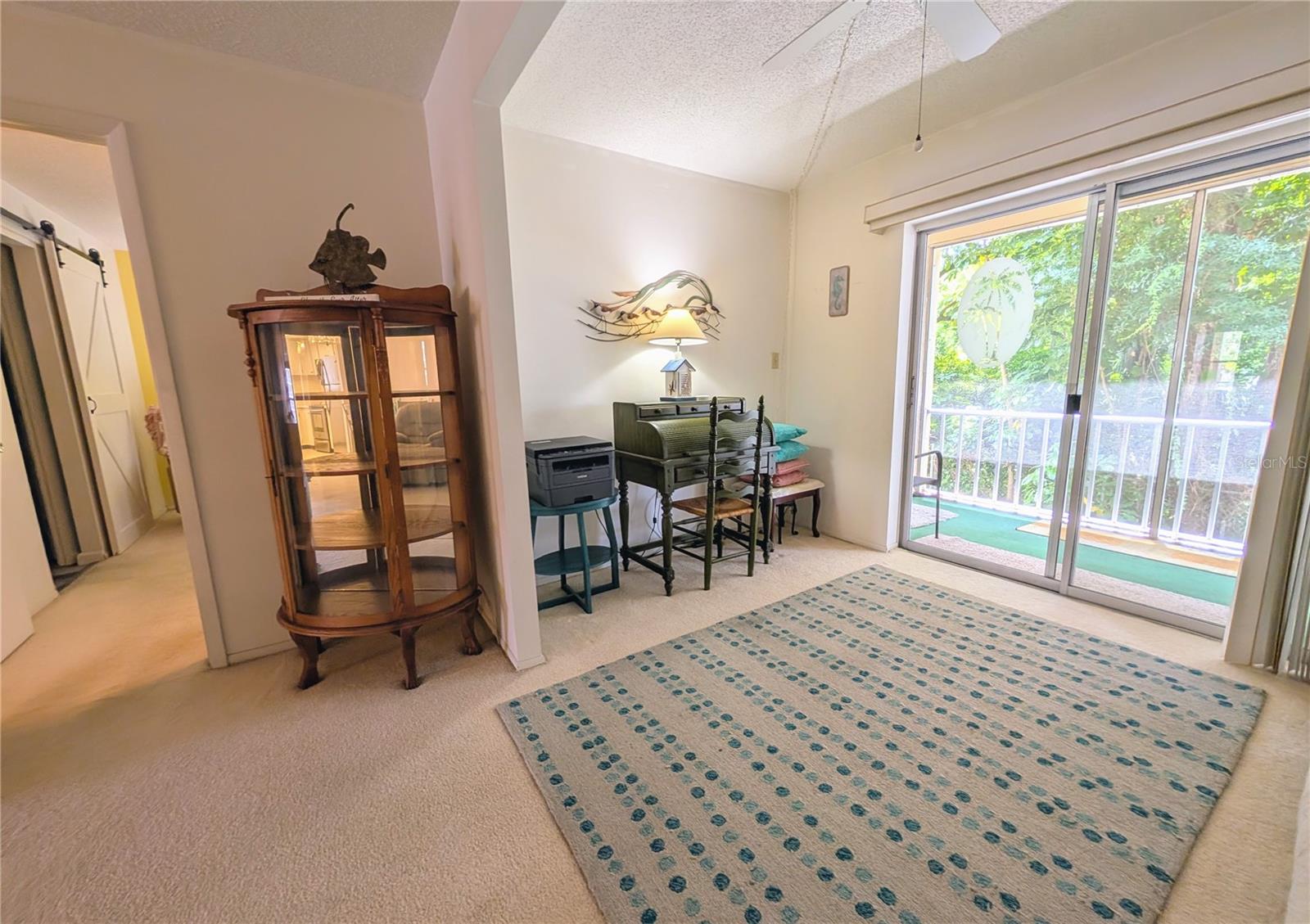 Roll top desk/printer visible here. Entrance to master BR and out on to lanai - 3564 LAKE BAYSHORE DR #K-203, BRADENTON