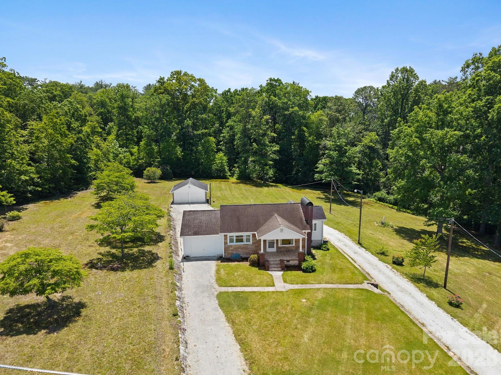 Aerial Close up showing SFR - 1230 Dana Road, Hendersonville