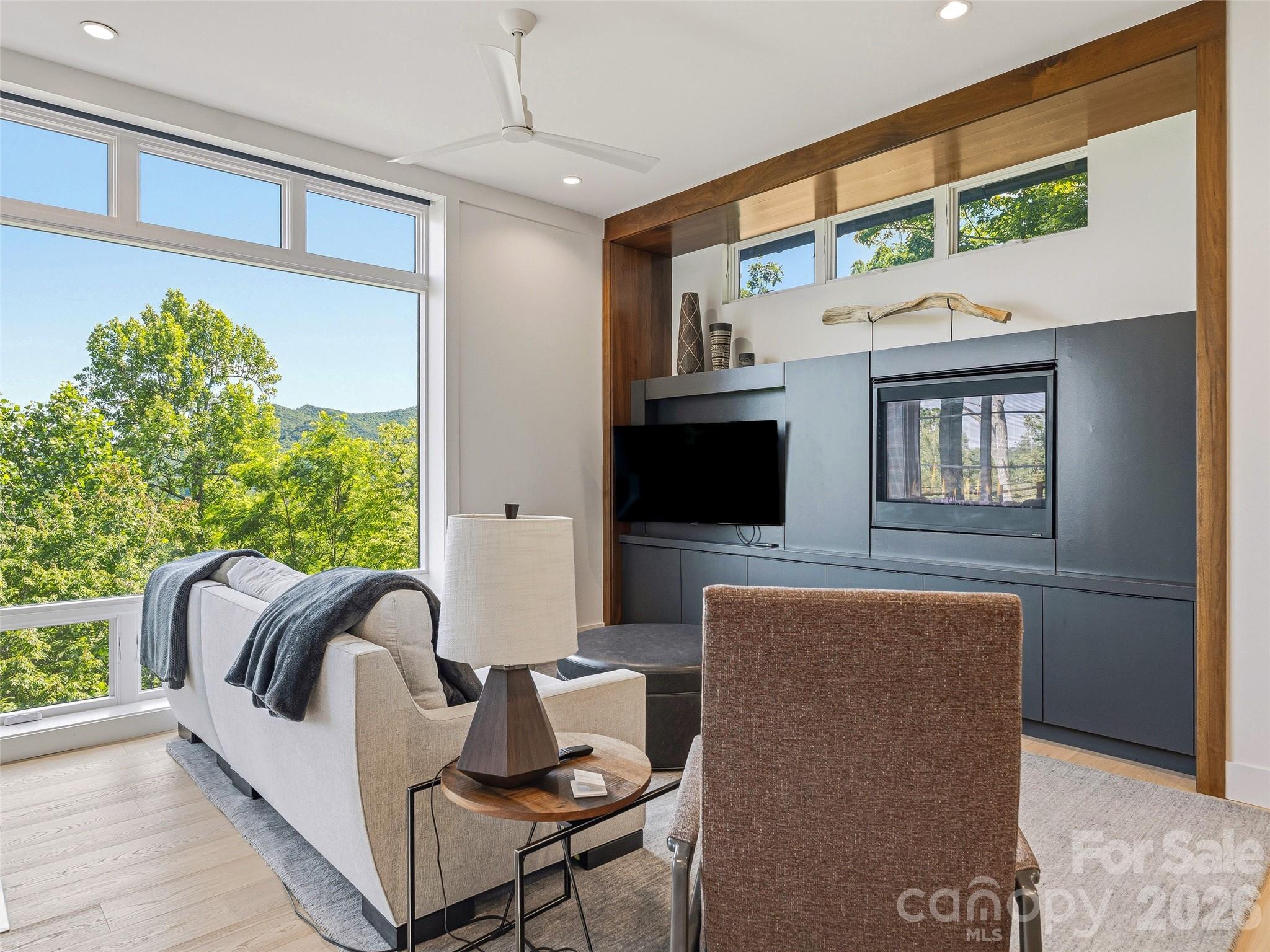 Comfortable fireside den bathed in natural light - 1121 Timberbluff Way, Arden