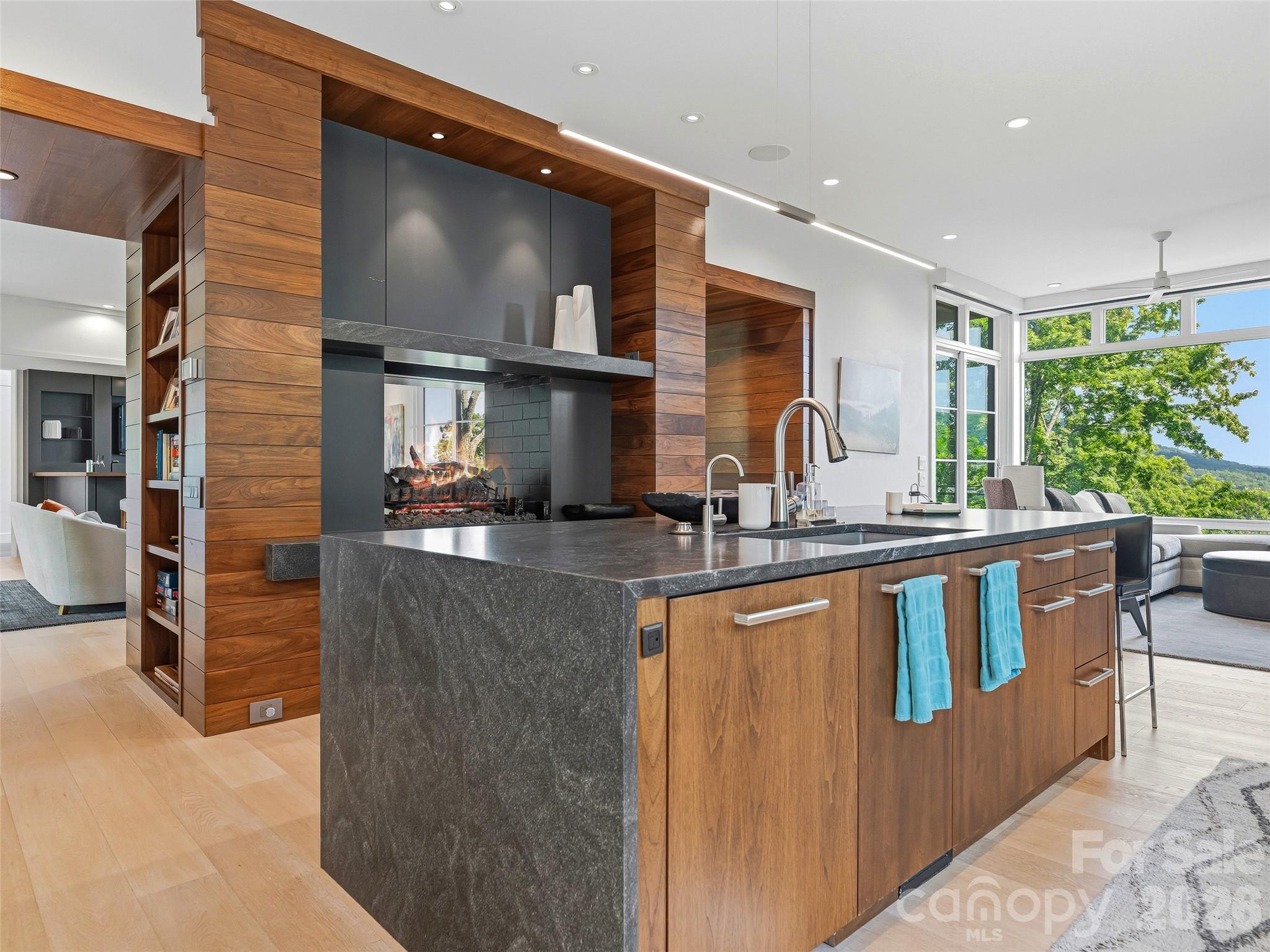 Open-concept design ideal for entertaining and everyday living - 1121 Timberbluff Way, Arden