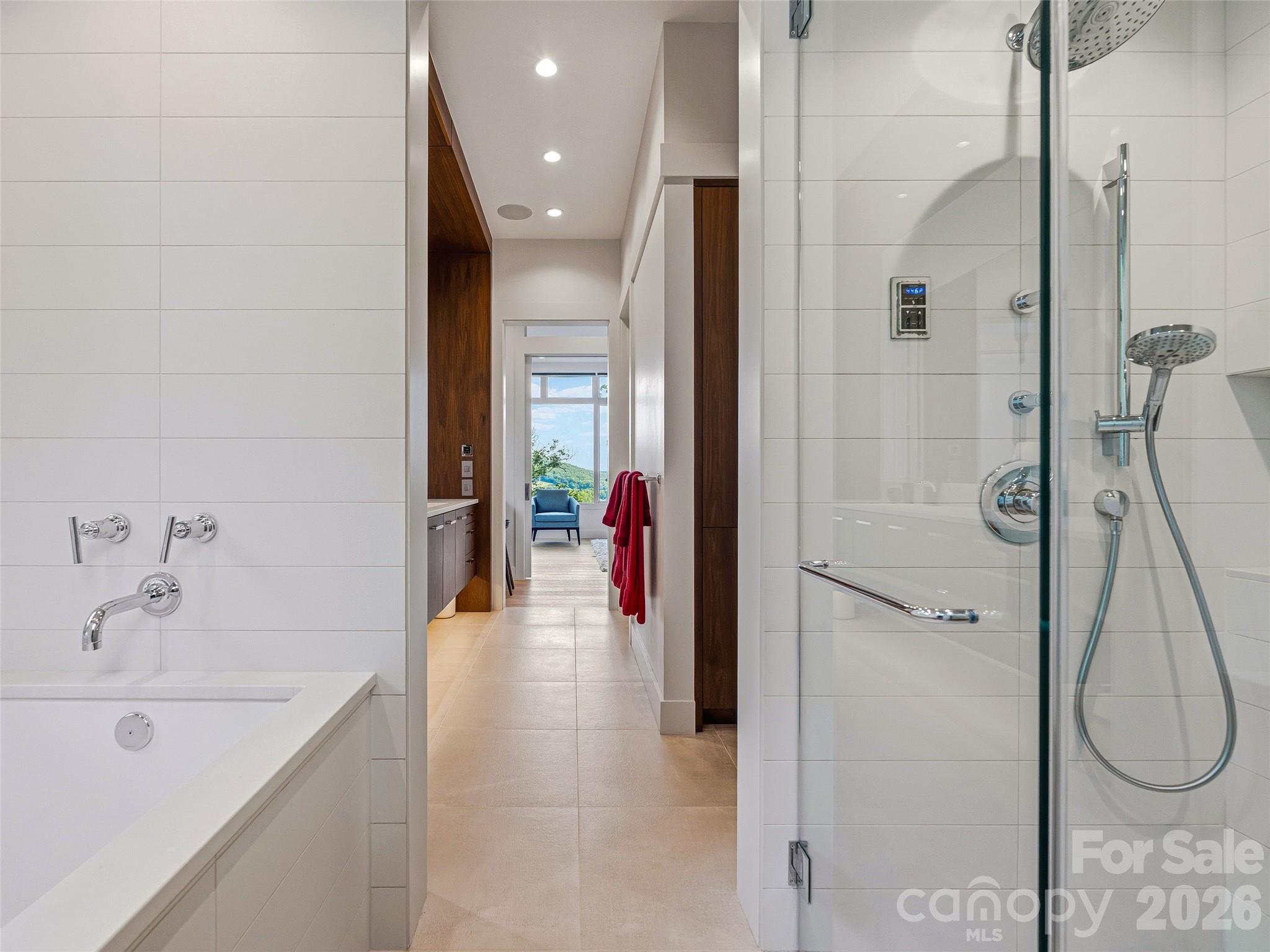 Elegant primary suite design with seamless bedroom-to-bath flow - 1121 Timberbluff Way, Arden