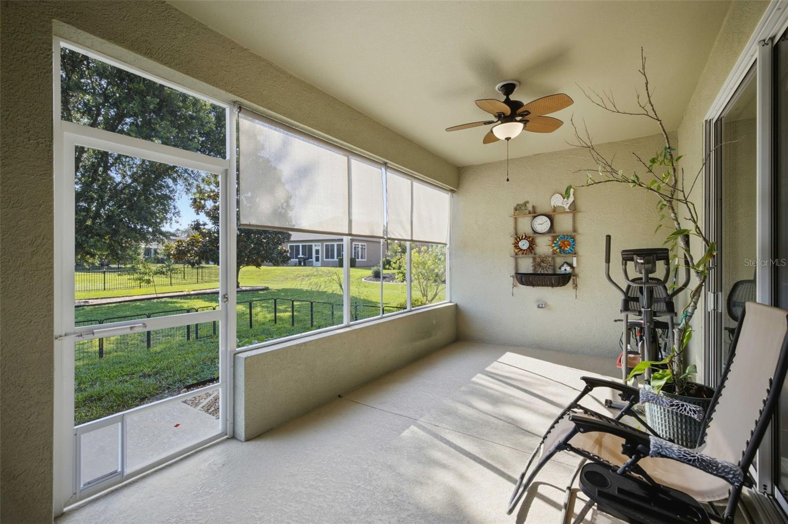 Doggy door to fenced area - 6951 SW 94TH CT, OCALA