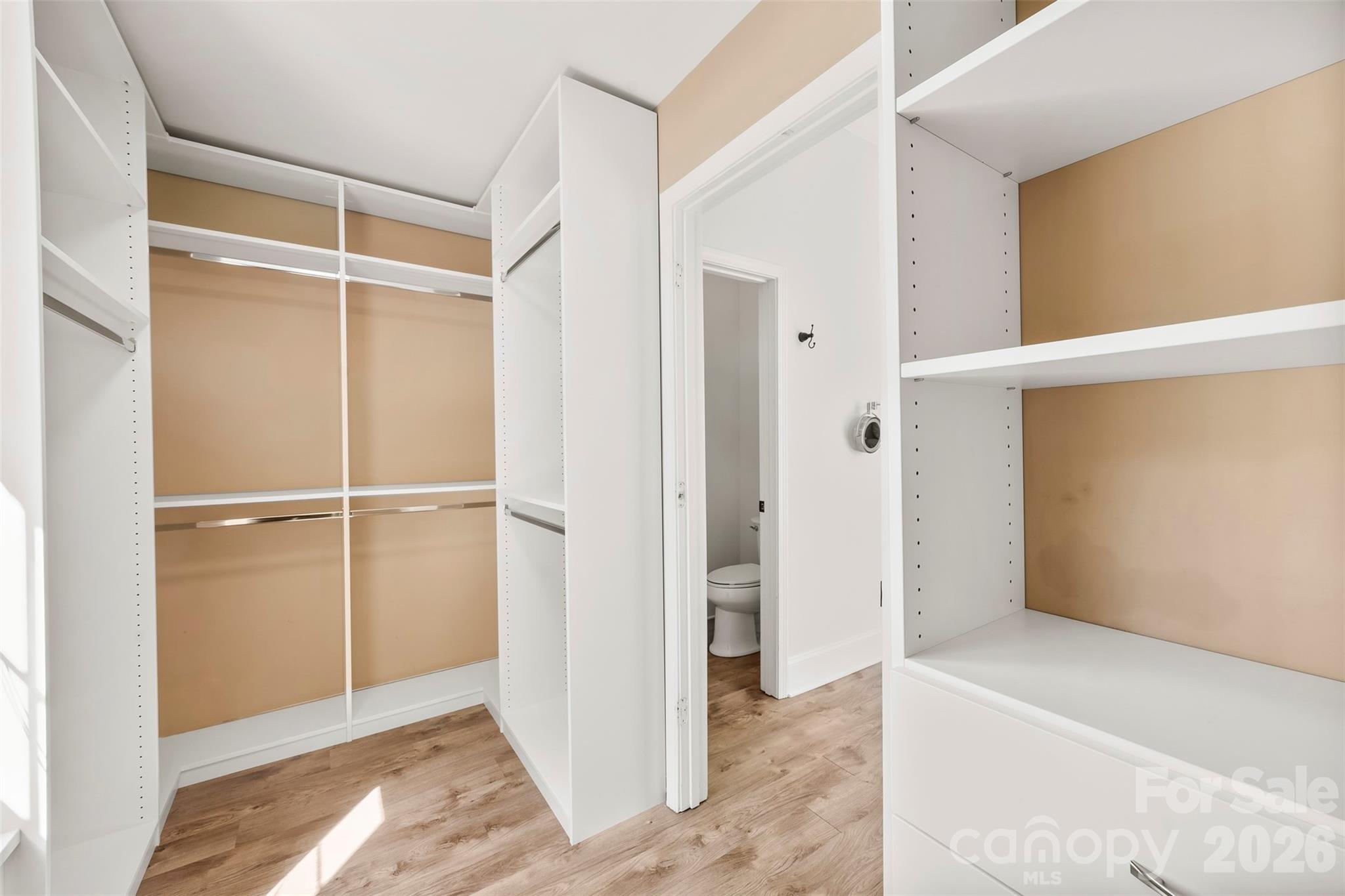 Custom walk in closet in primary bedroom - 8011 Maxwelton Drive, Huntersville