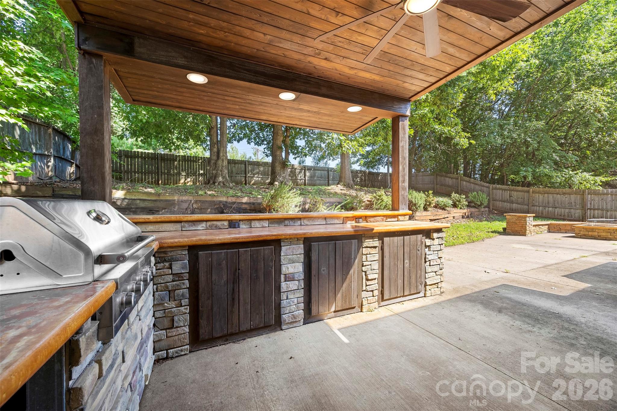 Outdoor kitchen with built in gas grill - 8011 Maxwelton Drive, Huntersville