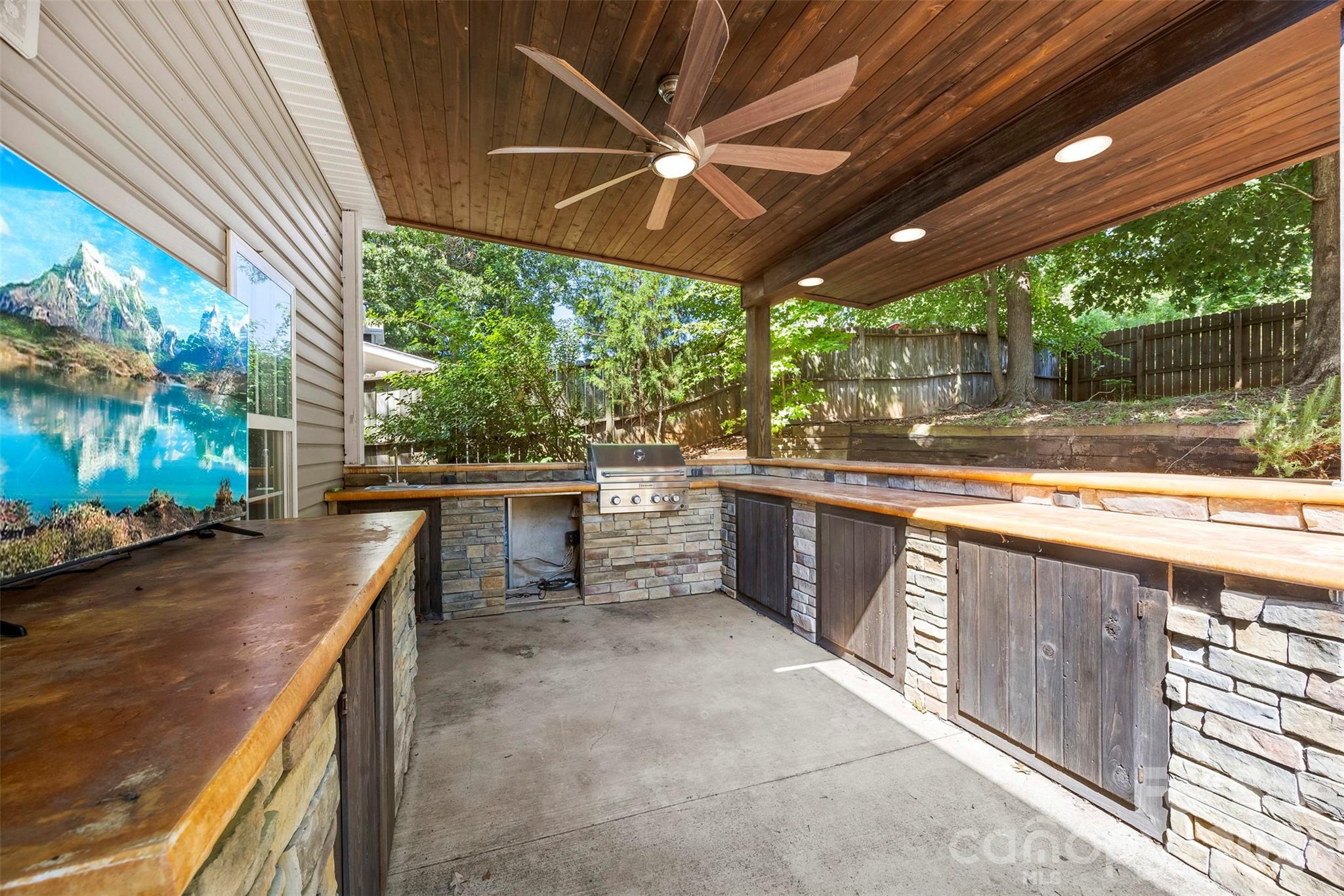 Covered with ceiling fan - 8011 Maxwelton Drive, Huntersville
