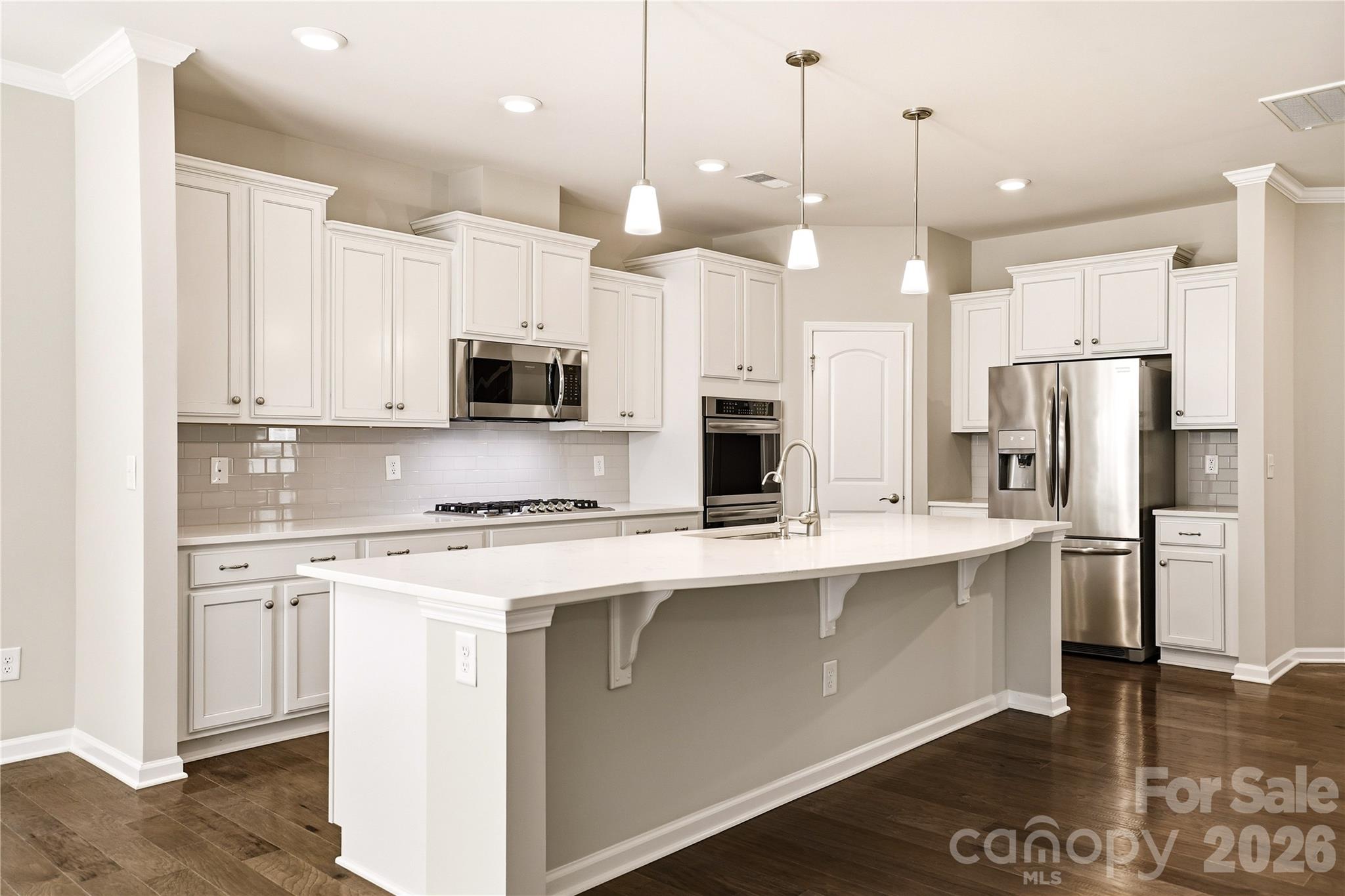 Oversized Statement Island Centerpiece with Quartz Countertops - 124 Van Gogh Trail, Mount Holly