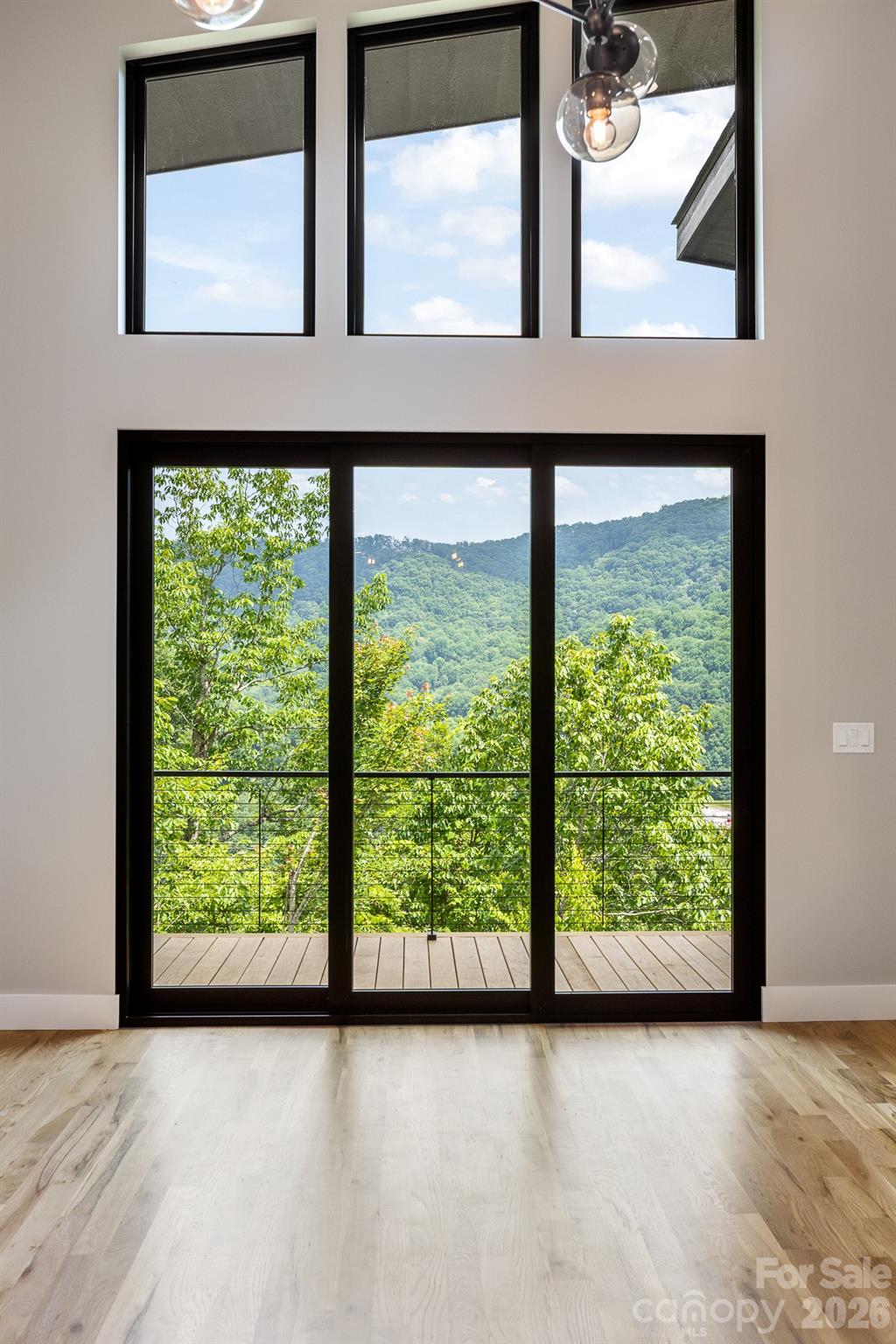 View through telescoping sliders. - 60 King Horn Ridge, Waynesville