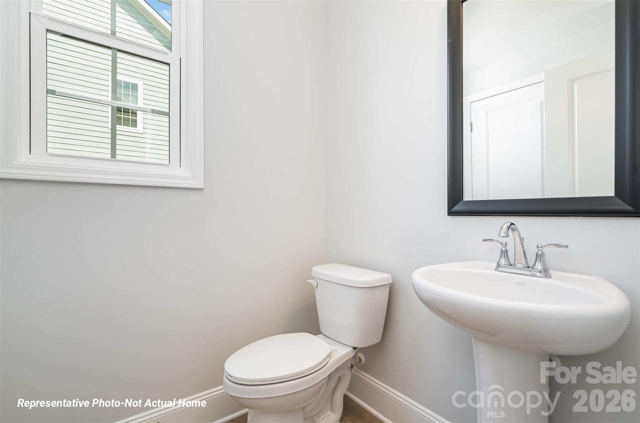 Example Half Bath Lower Level. *Not actual home. - 10225 Rainier Trail Drive NW, Huntersville