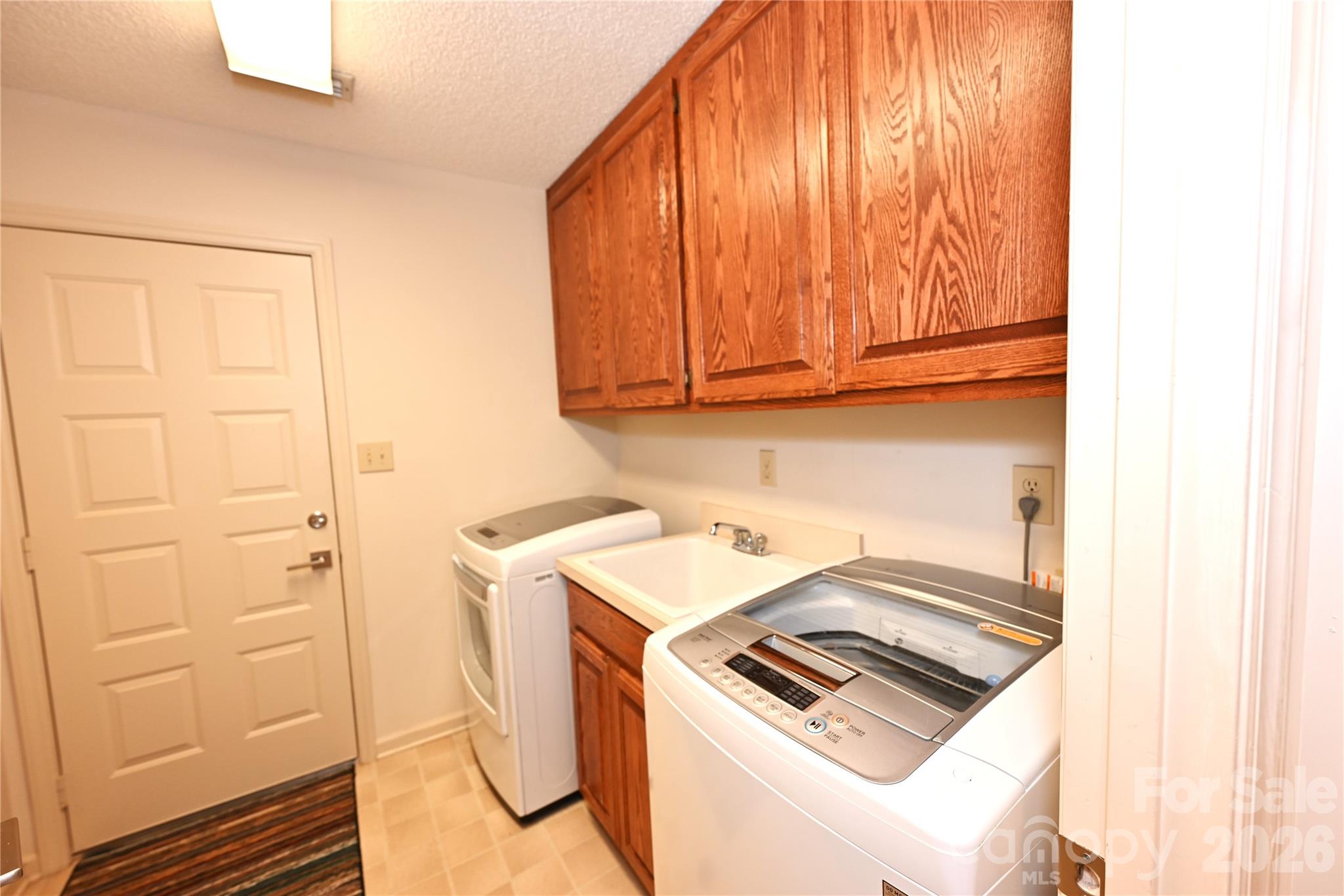 Laundry room with sink- Main Level - 3675 Rock Bridge Drive NE, Conover