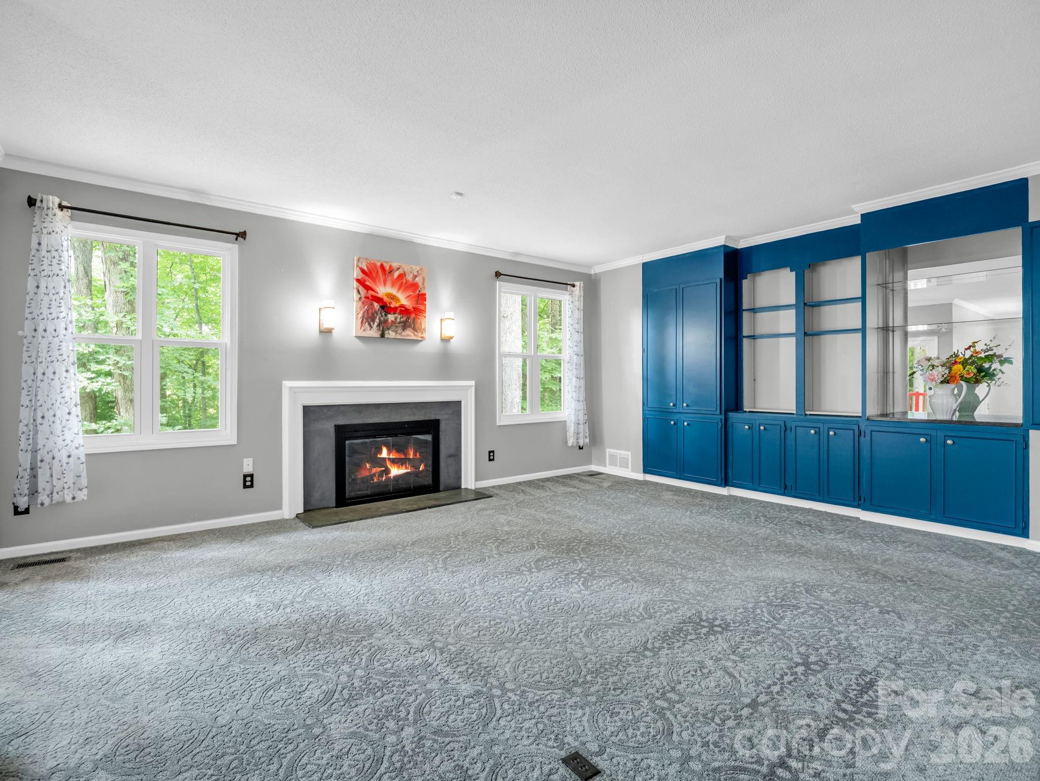 Gas log fireplace, built in cabinets for storage and media - 1810 Arbor Way Drive, Shelby