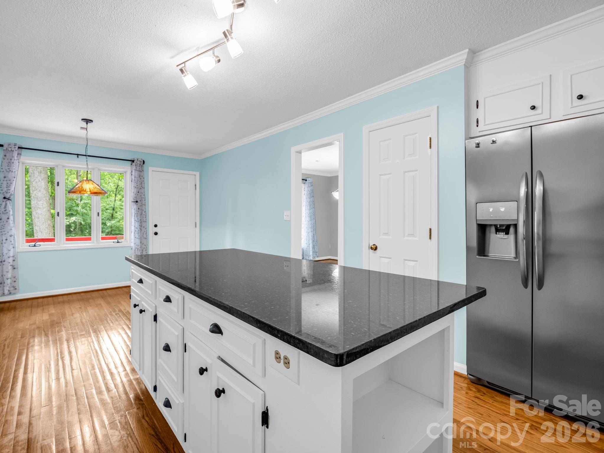 Large refrigerator with ice and water dispenser in door - 1810 Arbor Way Drive, Shelby