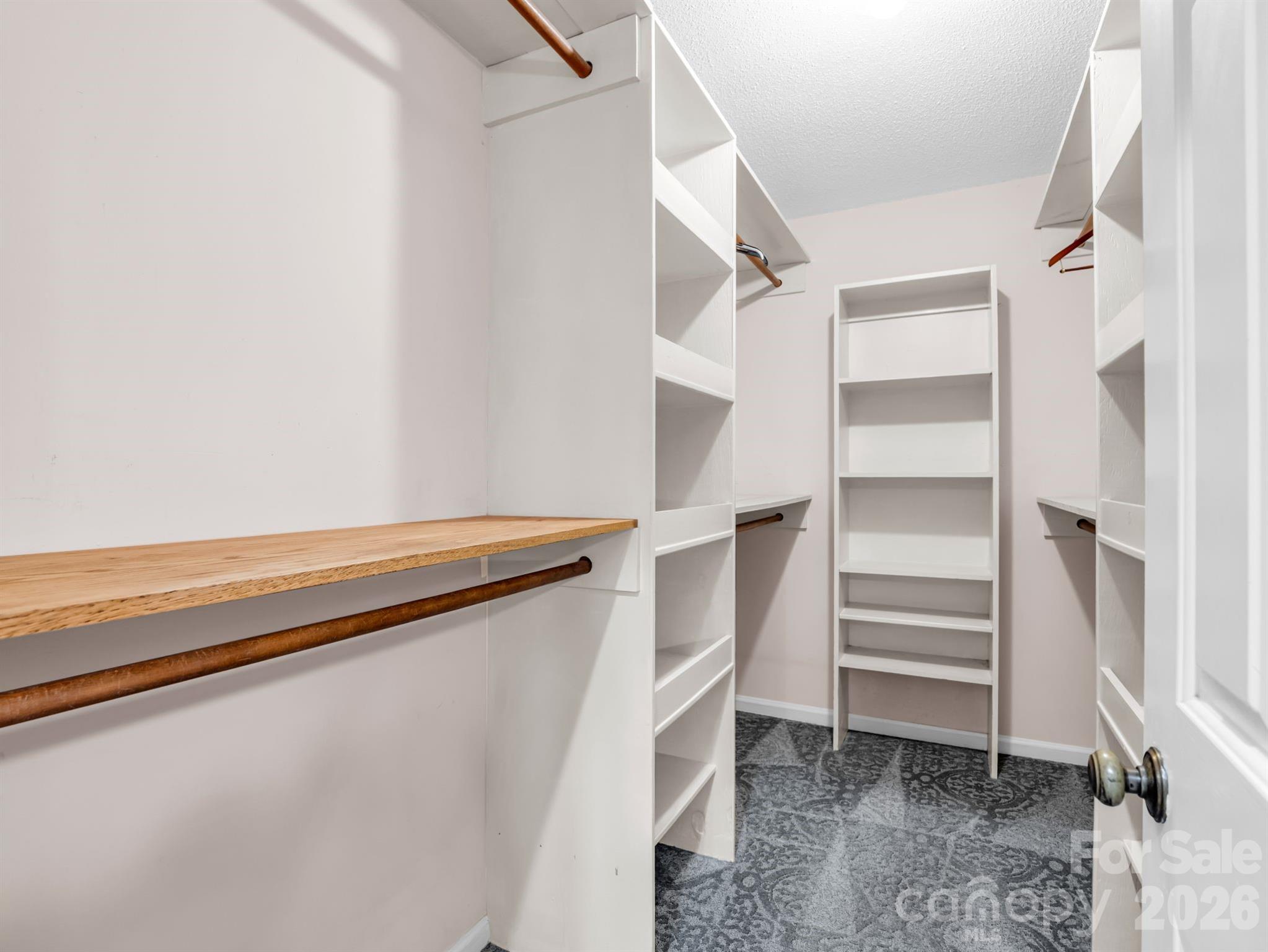 Primary walk-in closet - 1810 Arbor Way Drive, Shelby