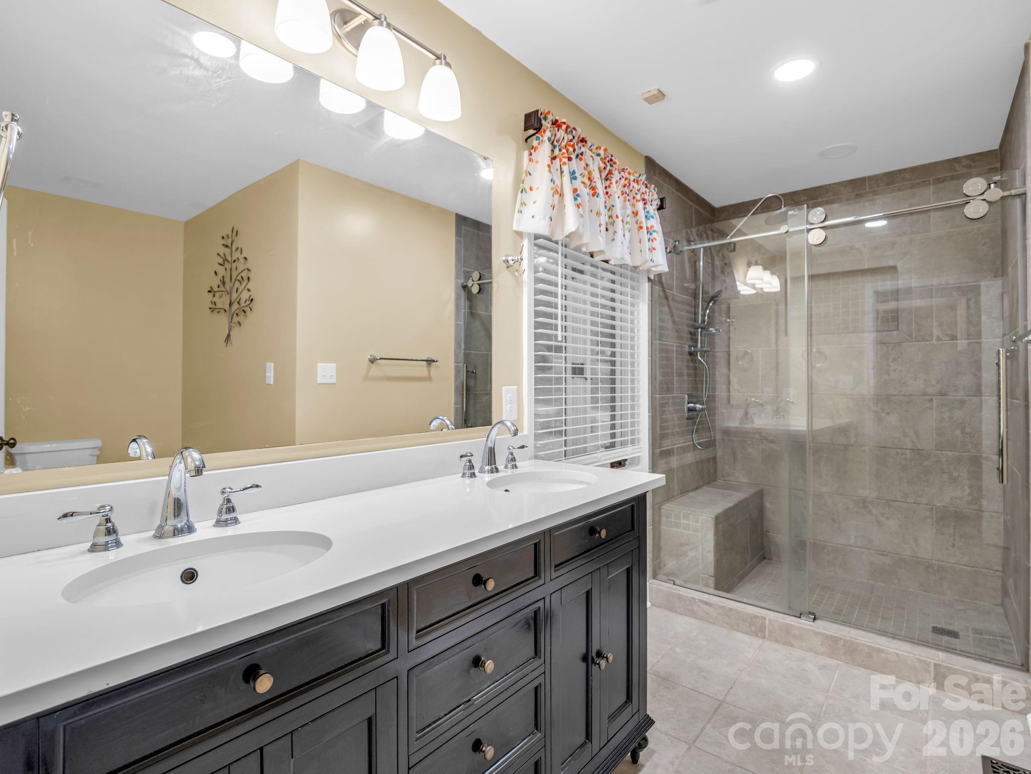 Large primary bath with double vanity, large tile shower - 1810 Arbor Way Drive, Shelby