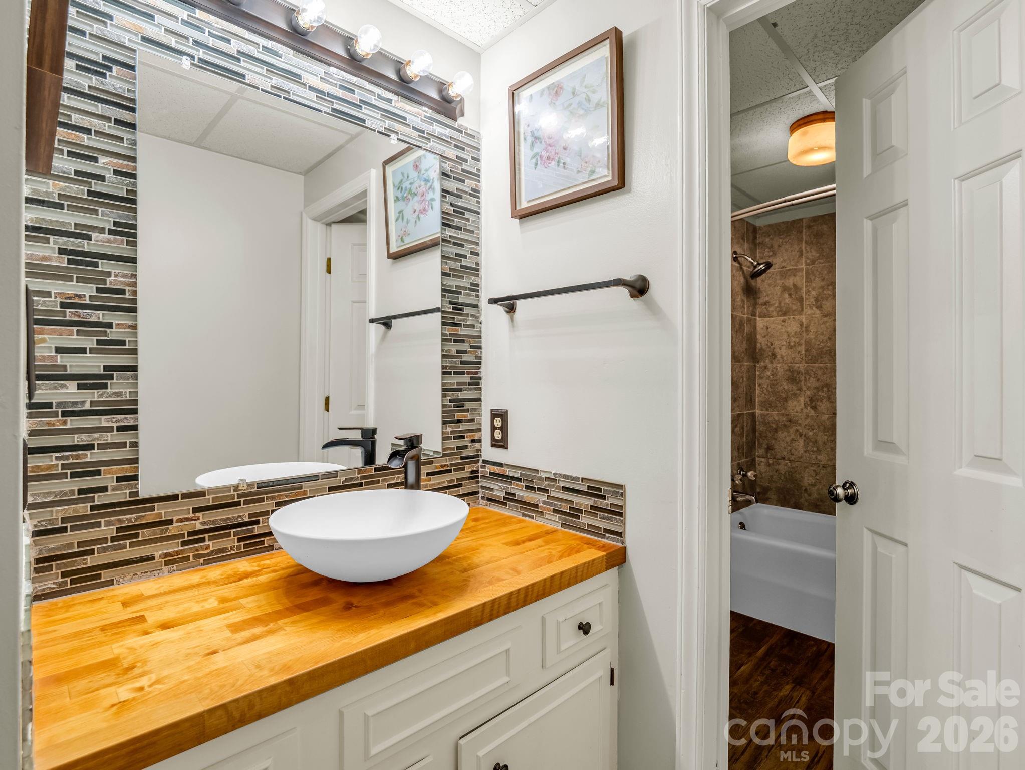 Vanity/sink in bedroom #4, access to Jack & Jill bathroom - 1810 Arbor Way Drive, Shelby