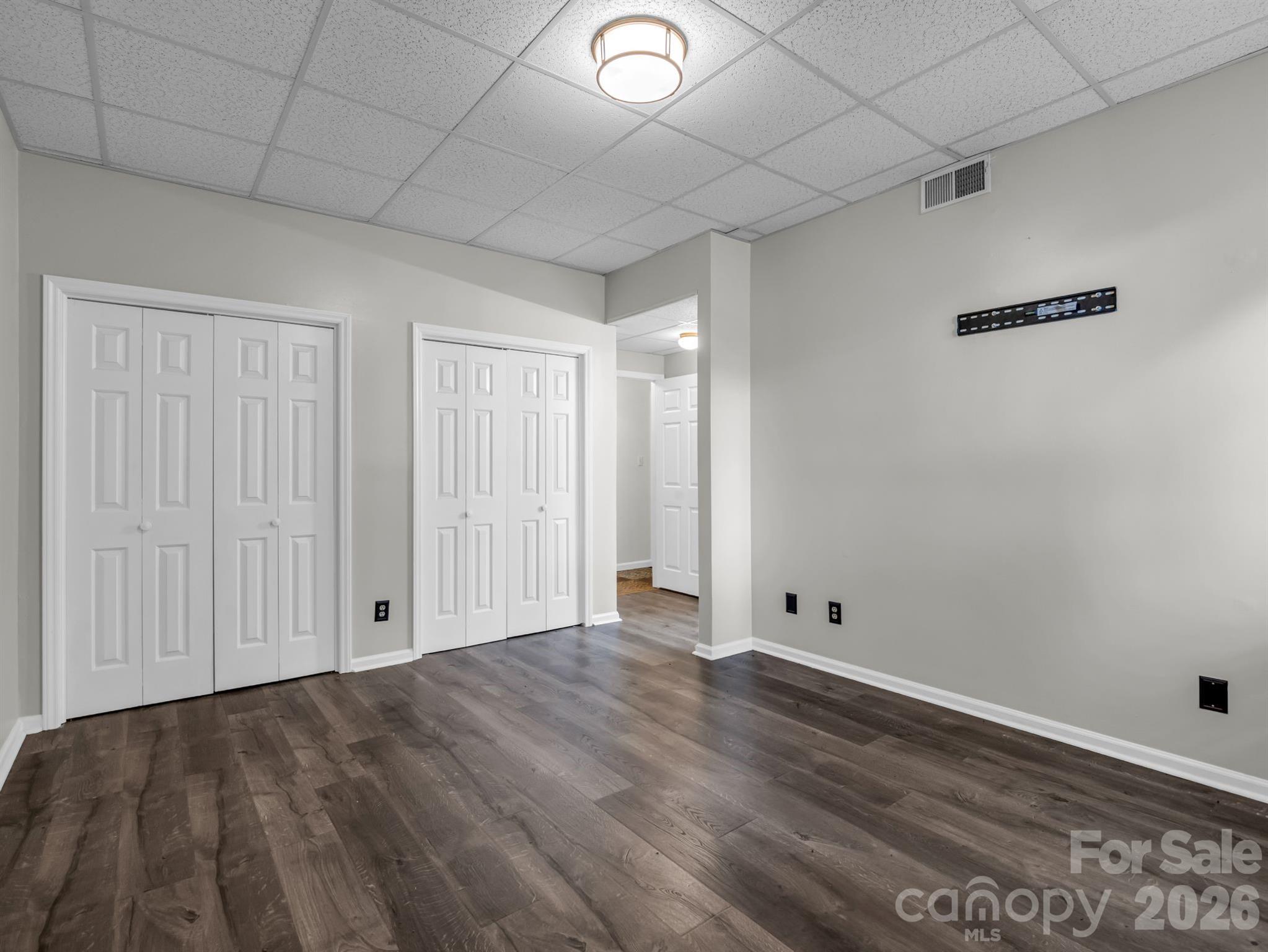 Bedroom #4 with wall of closets in lower level - 1810 Arbor Way Drive, Shelby