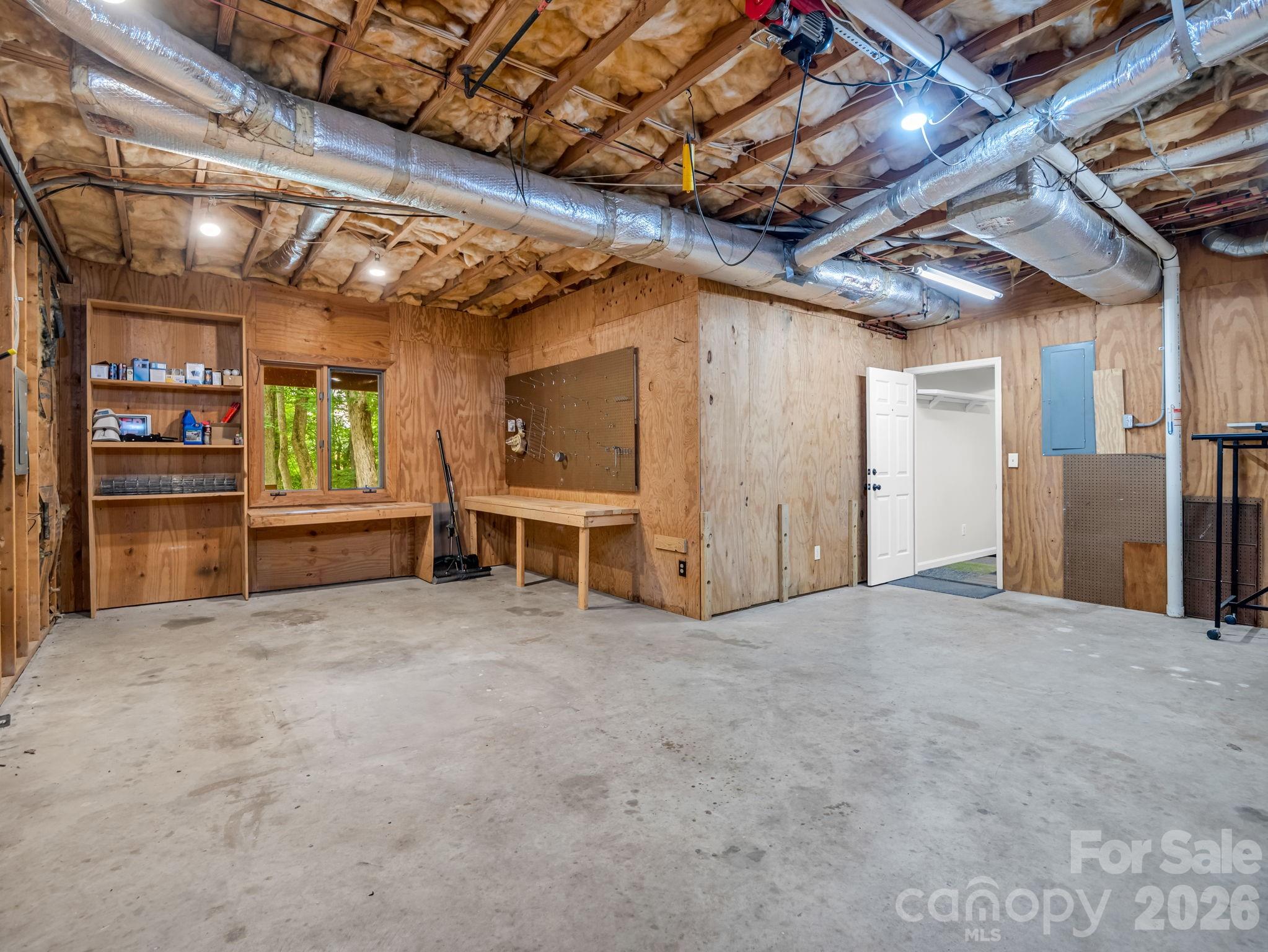 Spacious workshop in basement - 1810 Arbor Way Drive, Shelby