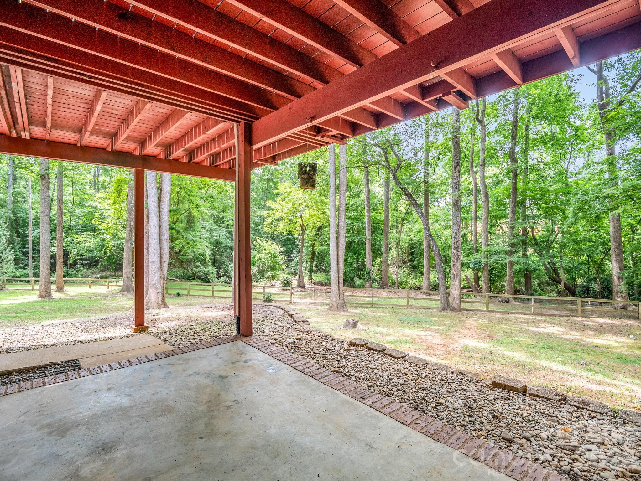 Covered back patio off of family room - 1810 Arbor Way Drive, Shelby