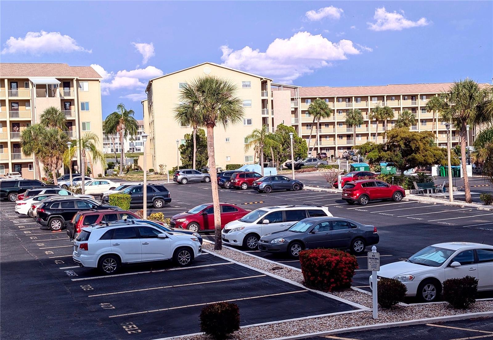 K-203's balcony view w/bit of lake between 2 bldgs - 3564 LAKE BAYSHORE DR #K-203, BRADENTON