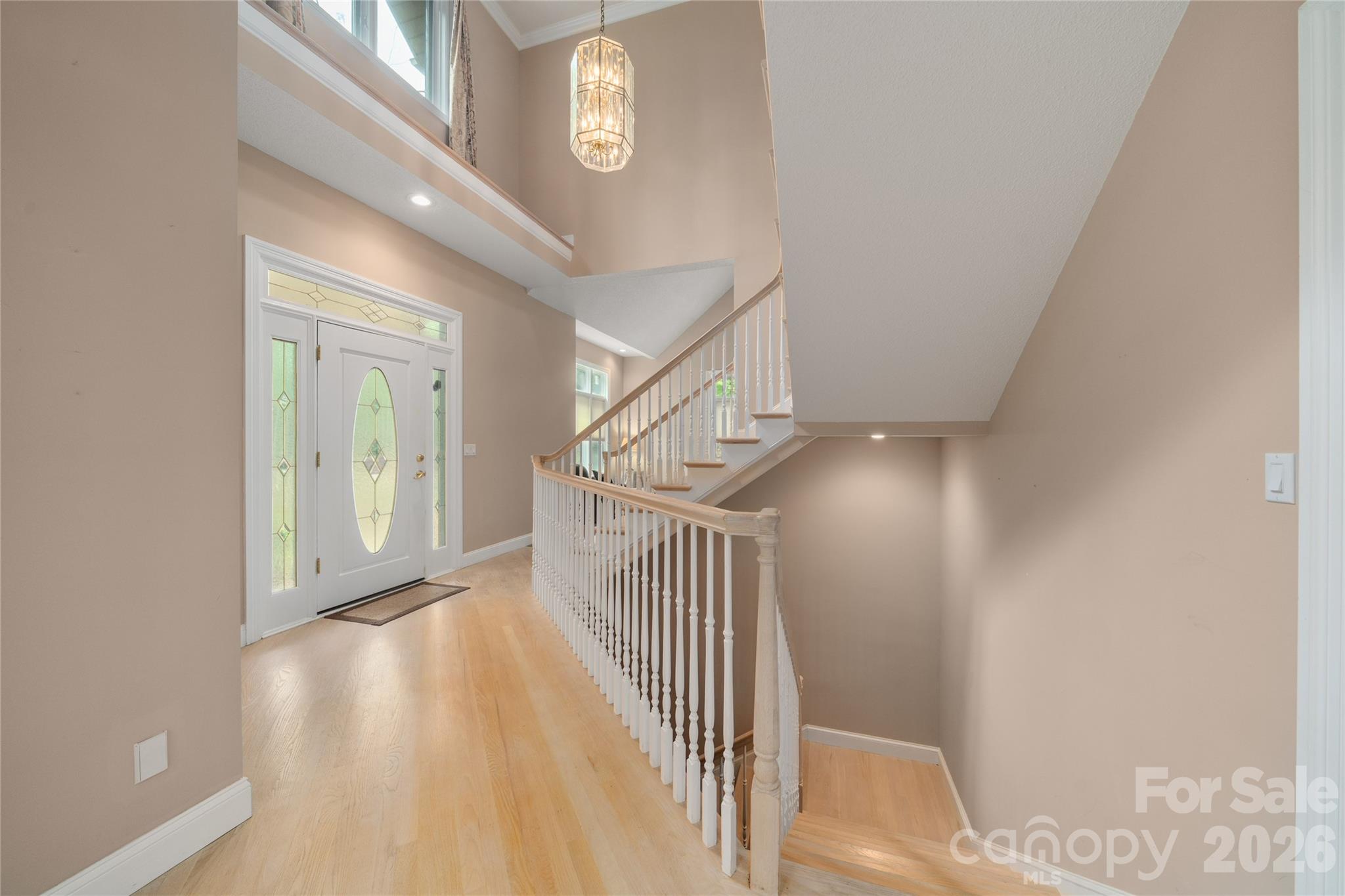 Foyer with hardwood floors - 136 Rumbling Bald Road, Lake Lure